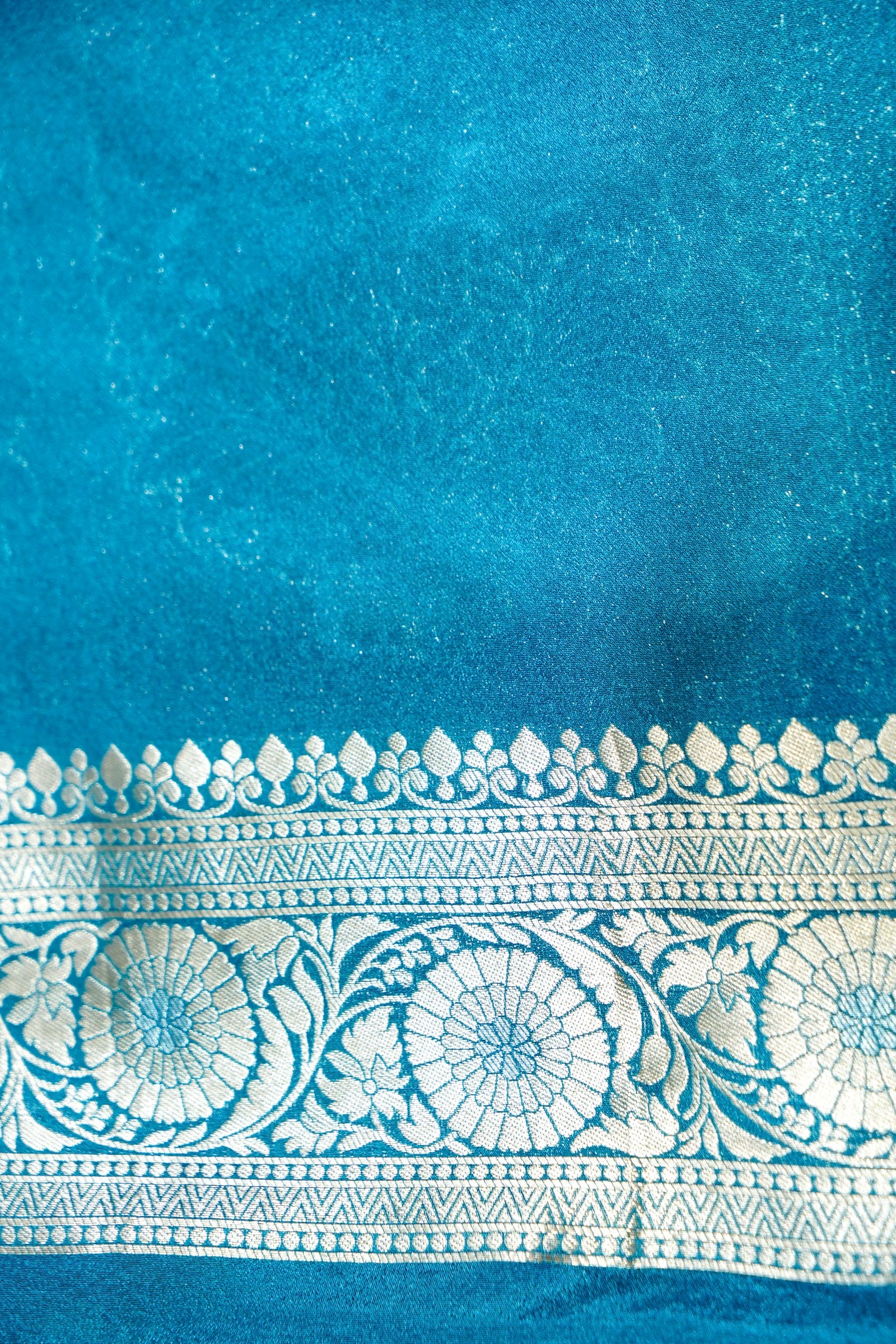 Wine Purple Crepe Georgette Silk Saree with Sea Green Border and Gold - Silver Weave