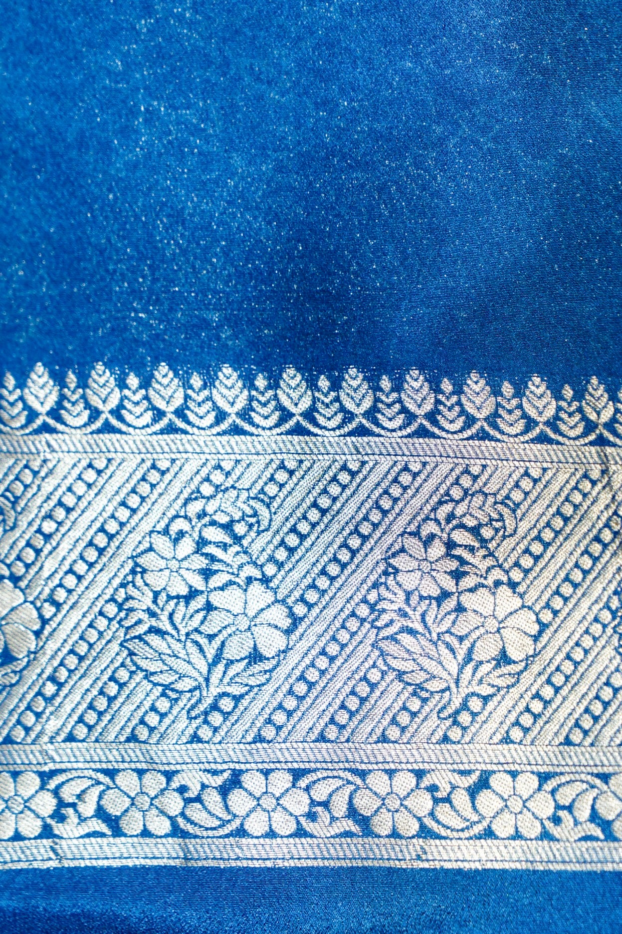 Rust Orange Paisley Crepe Georgette Silk Saree with Cobalt Blue Border