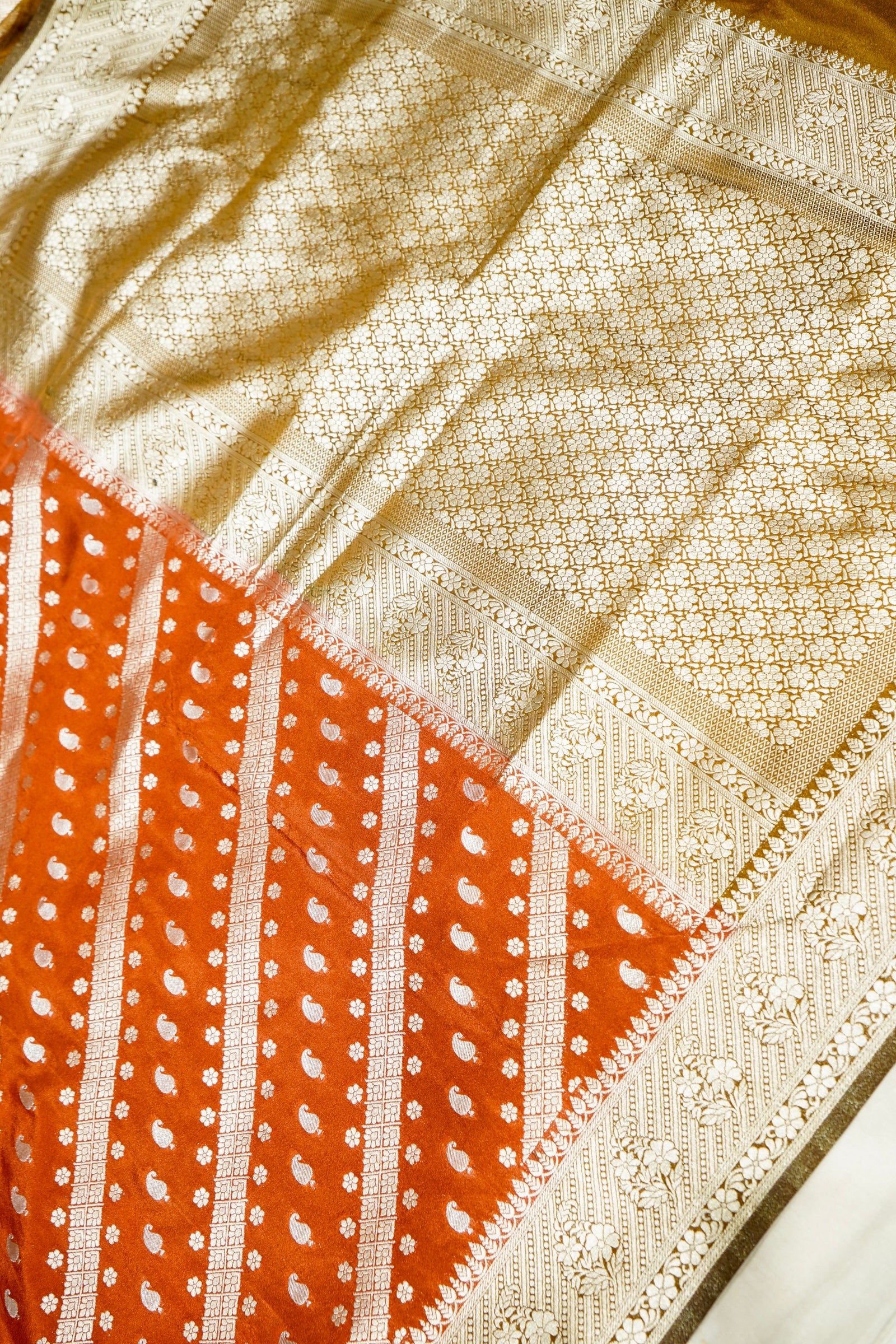 Rust Orange Paisley Crepe Georgette Silk Saree with Mustard Gold Border