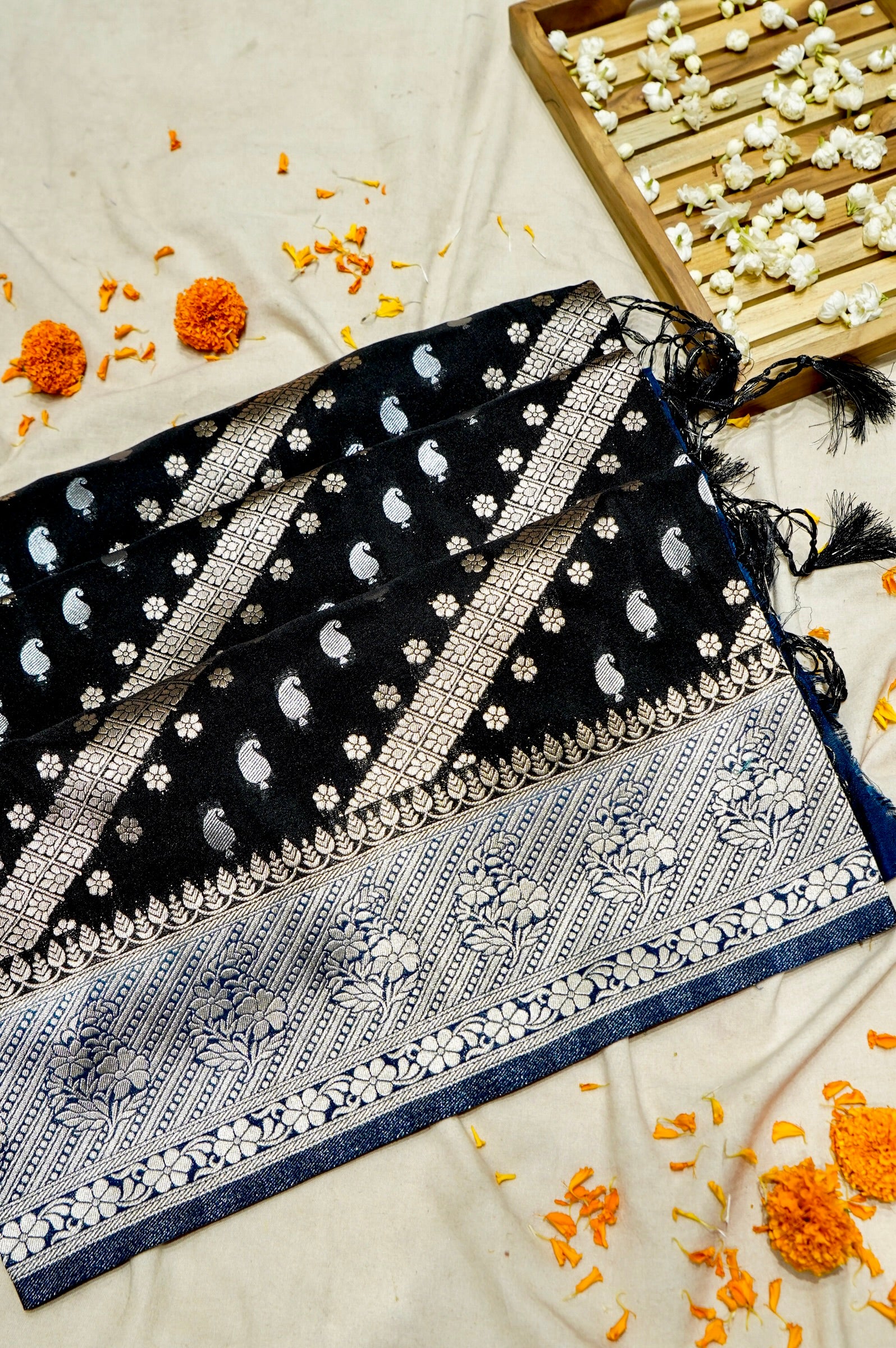 Jet Black Paisley Crepe Georgette Silk Saree with Royal Blue Border