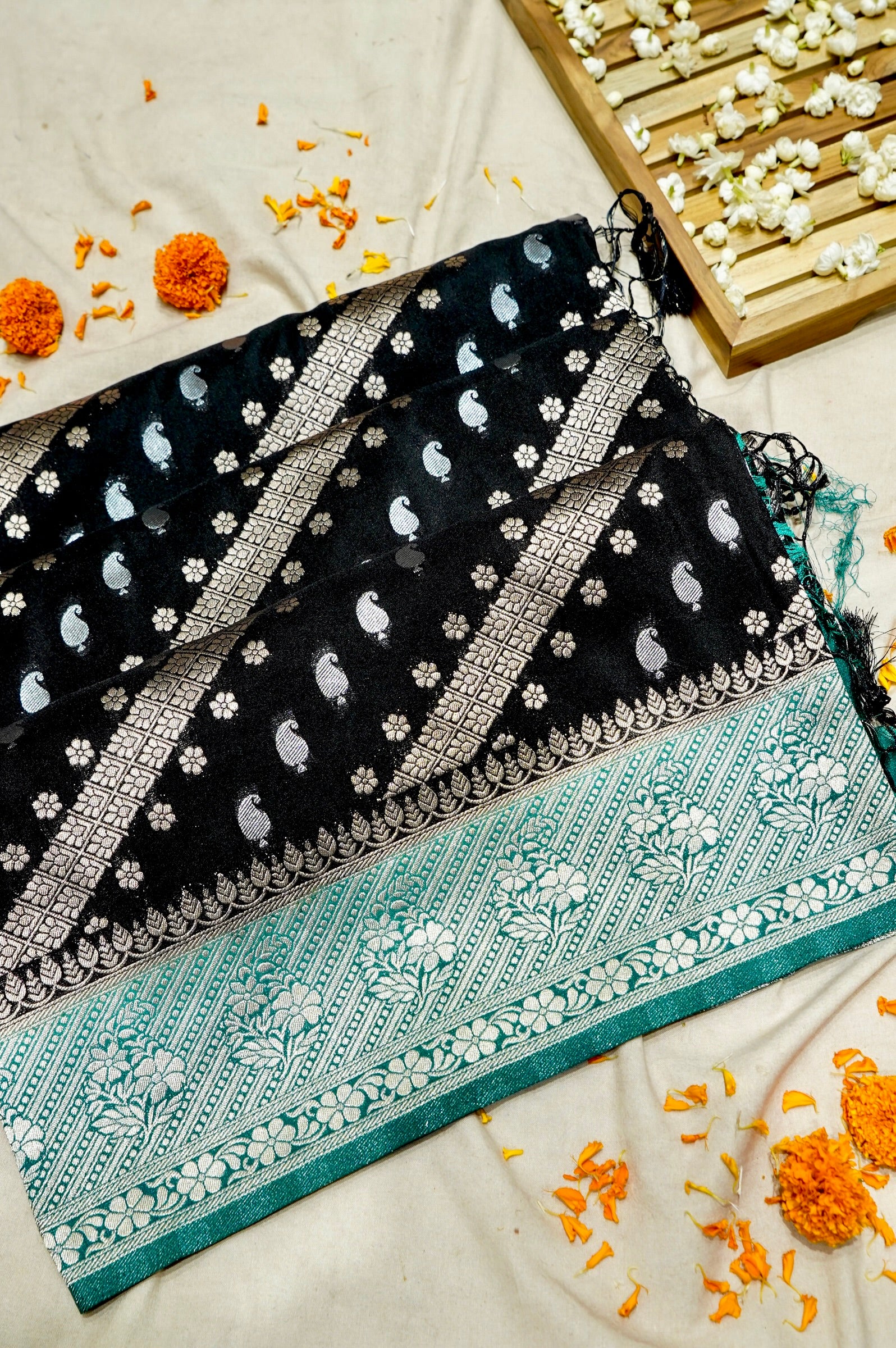 Jet Black Paisley Crepe Georgette Silk Saree with Sea Green Border