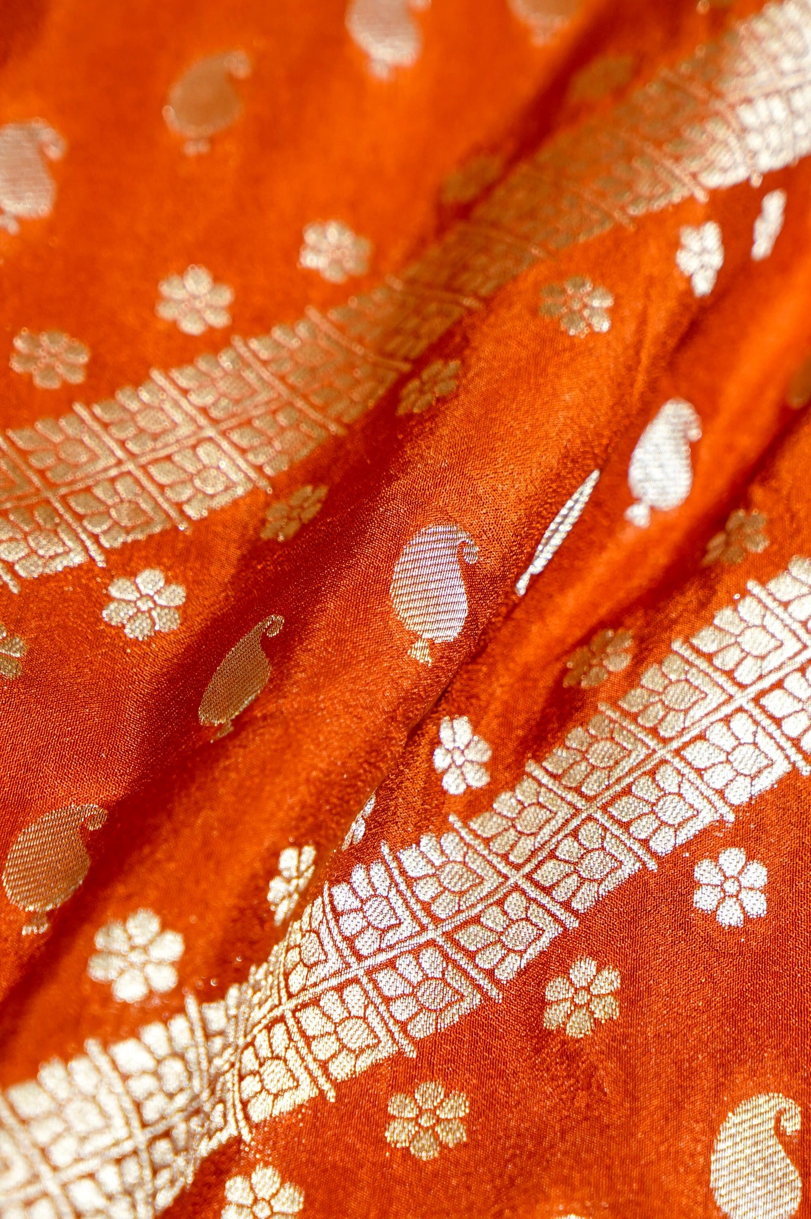 Rust Orange Paisley Crepe Georgette Silk Saree with Royal Purple Border