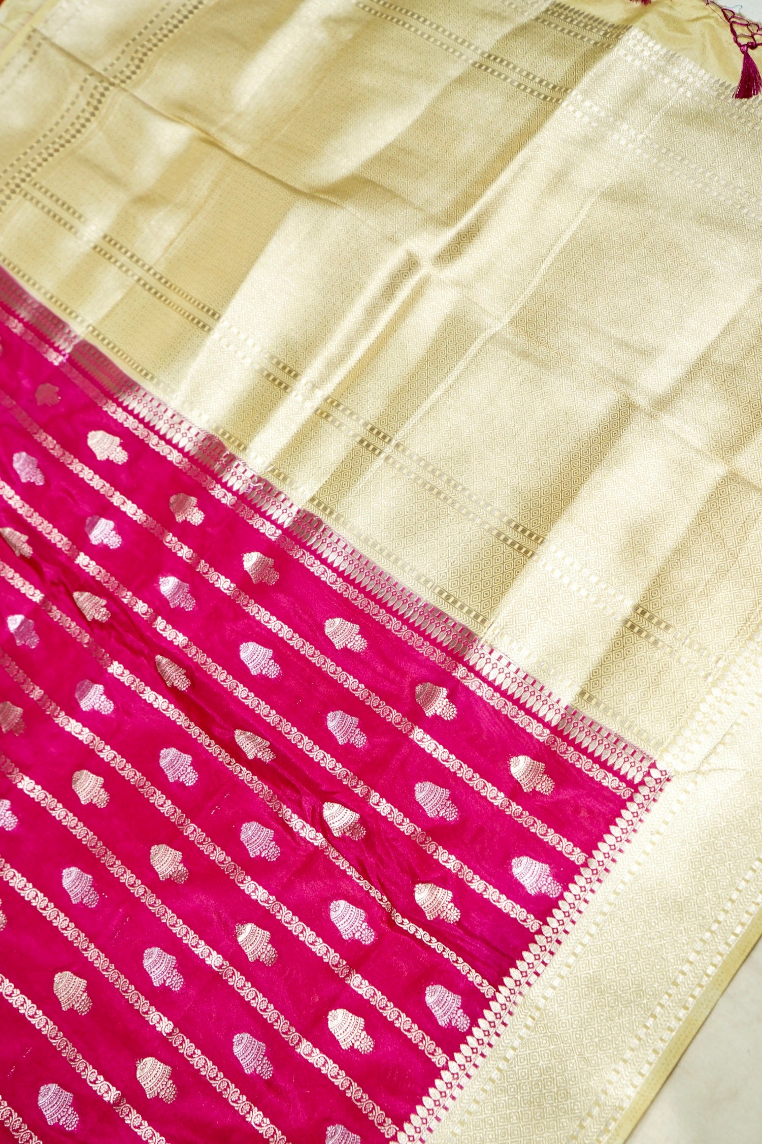 Rani Pink Bell Motifs Crepe Georgette Silk Saree with Champagne Border