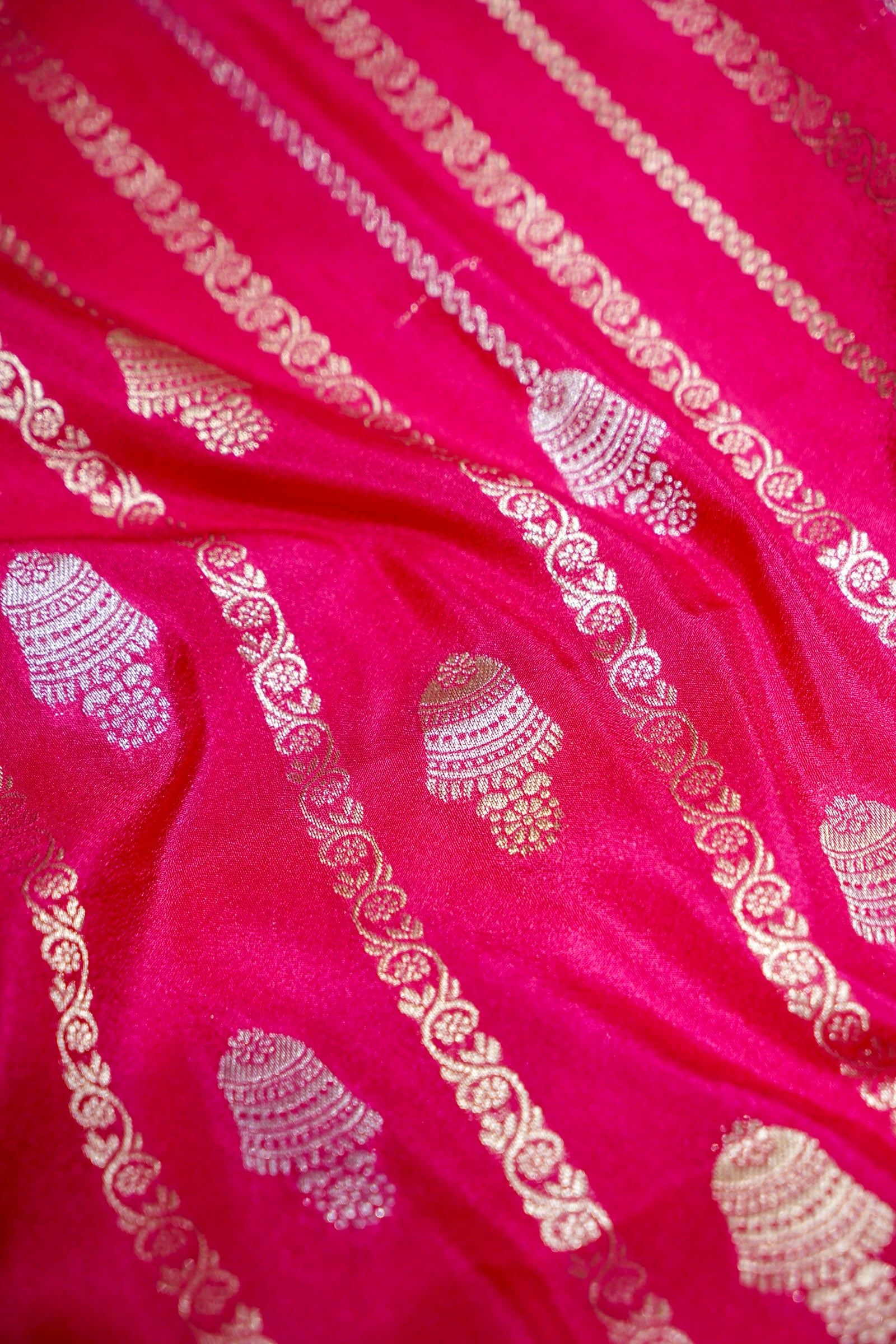 Rani Pink Bell Motifs Crepe Georgette Silk Saree with Champagne Border