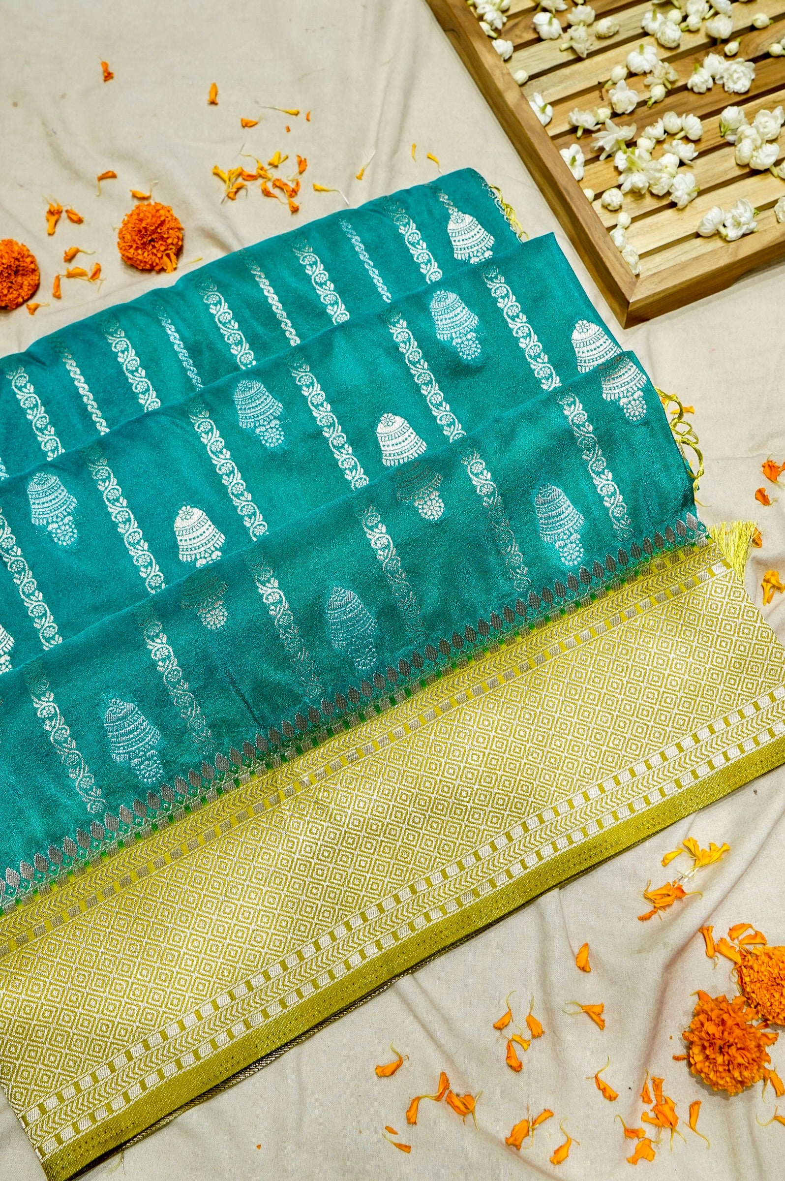 Turquoise Blue Bell Motifs Crepe Georgette Silk Saree with line green Border