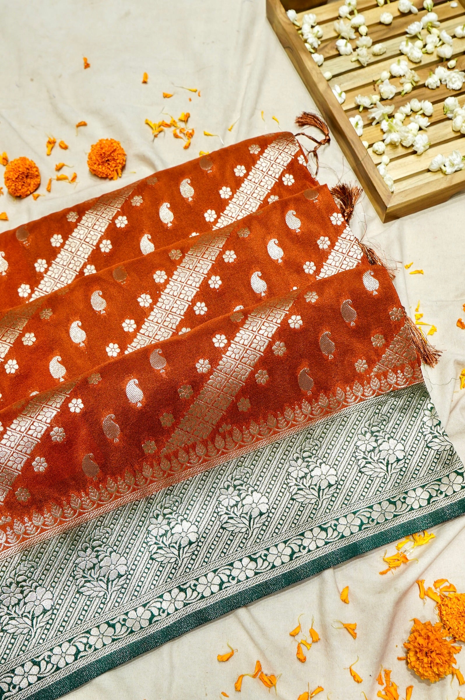 Rust Orange Paisley Crepe Georgette Silk Saree with Jade Green Border