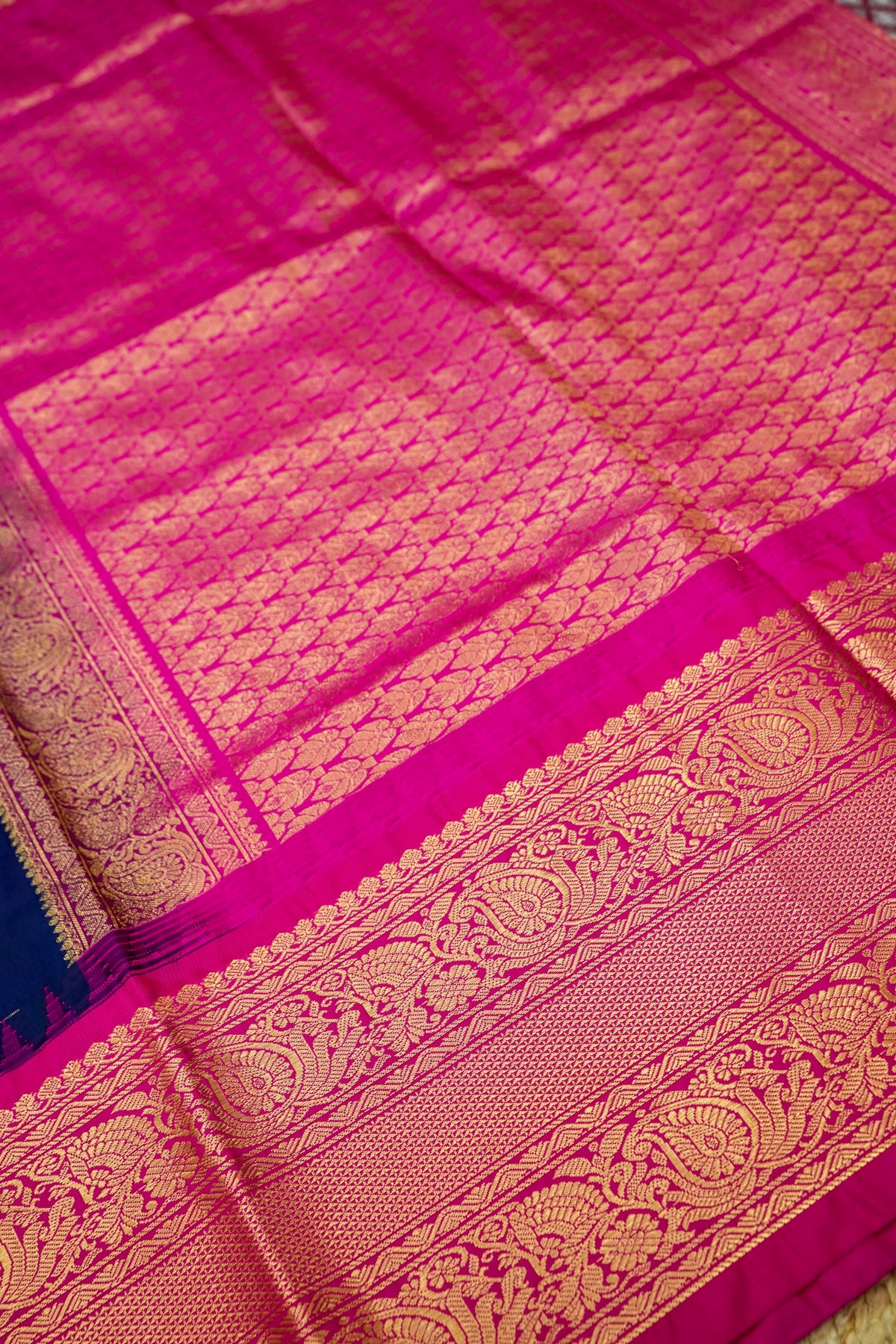 Suvarna - Navy Blue Gadwal Silk Saree with Rani Pink Gold Border
