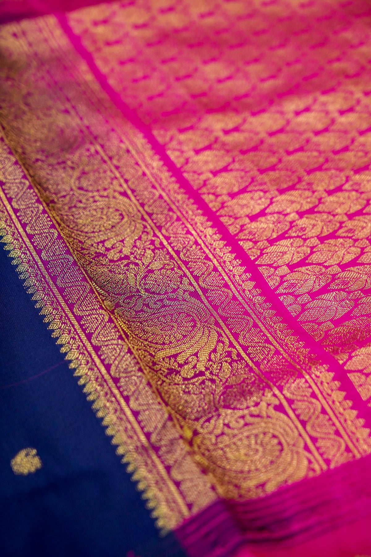 Suvarna - Navy Blue Gadwal Silk Saree with Rani Pink Gold Border