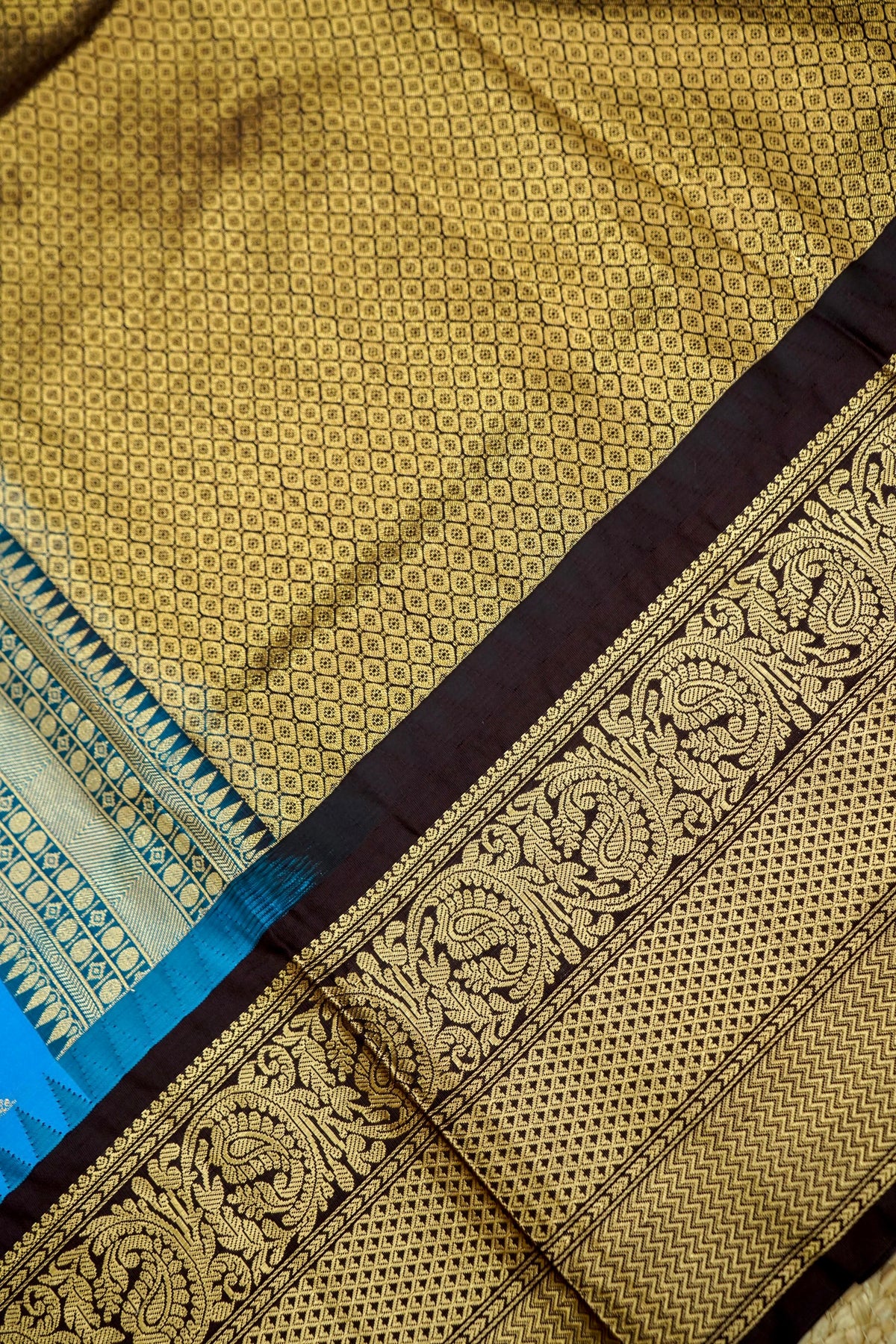 Suvarna - Bright Turquoise Blue Gadwal Silk Saree with Brown Gold Border
