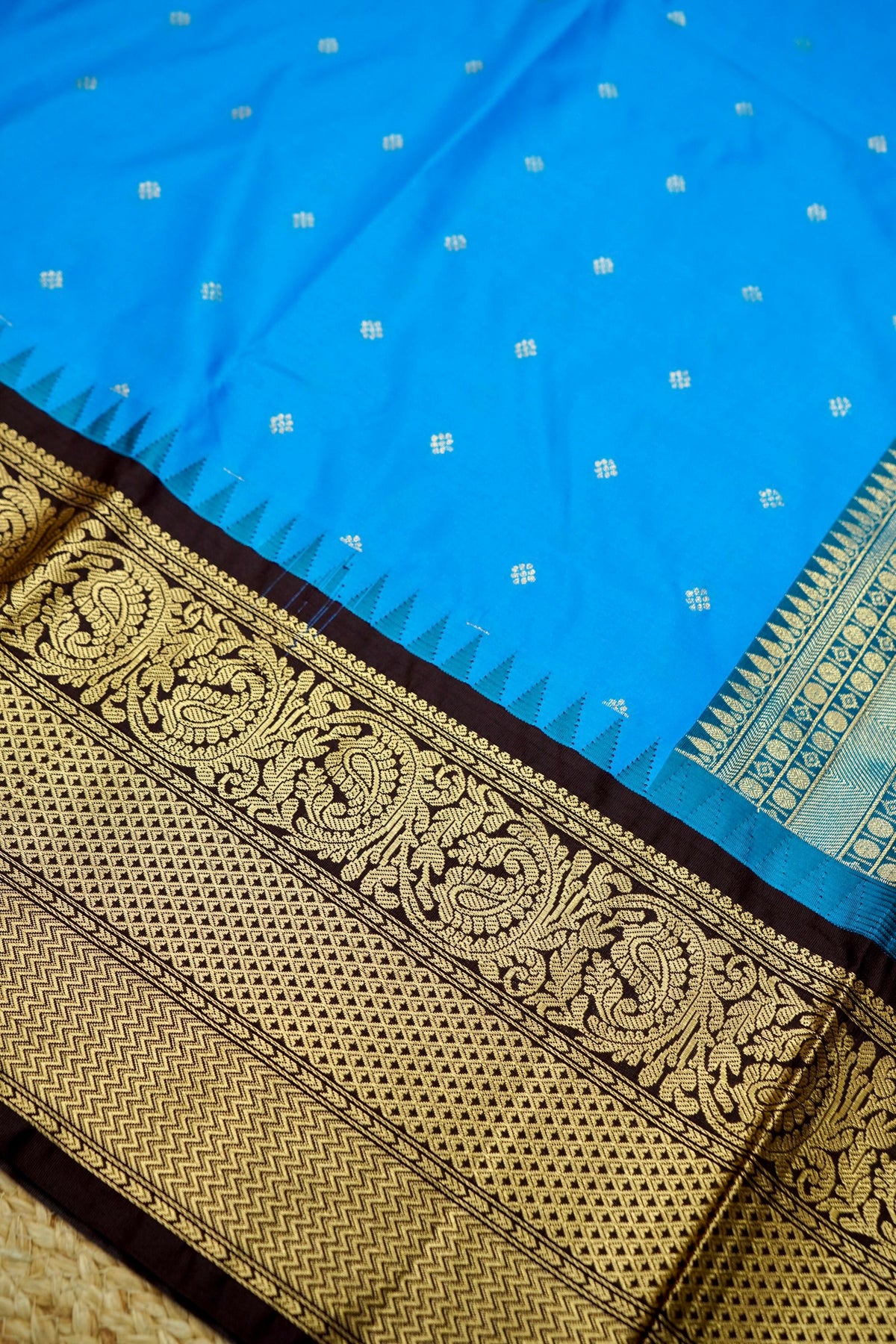 Suvarna - Bright Turquoise Blue Gadwal Silk Saree with Brown Gold Border