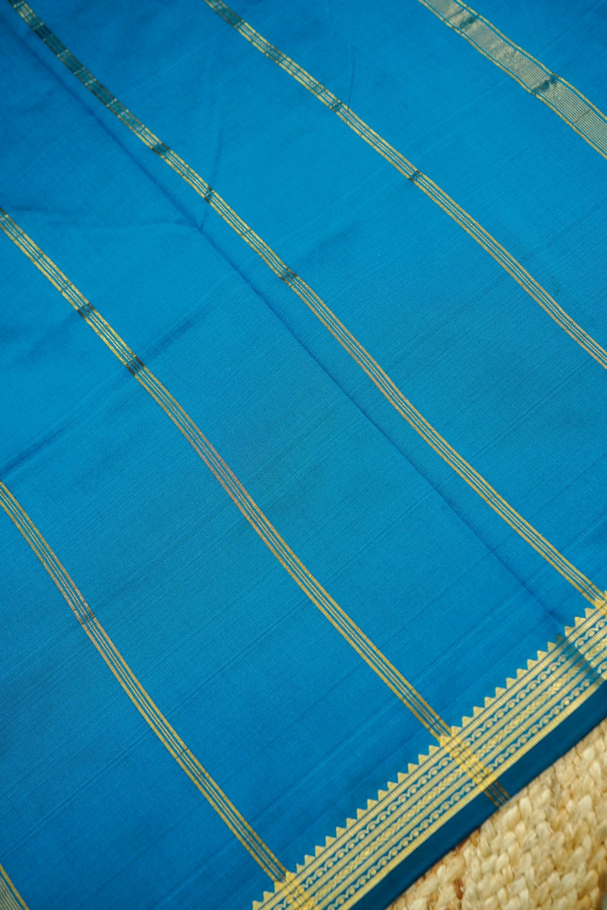 Suvarna - Peacock Blue Mysore Crepe Silk Saree with Gold Kaat Border