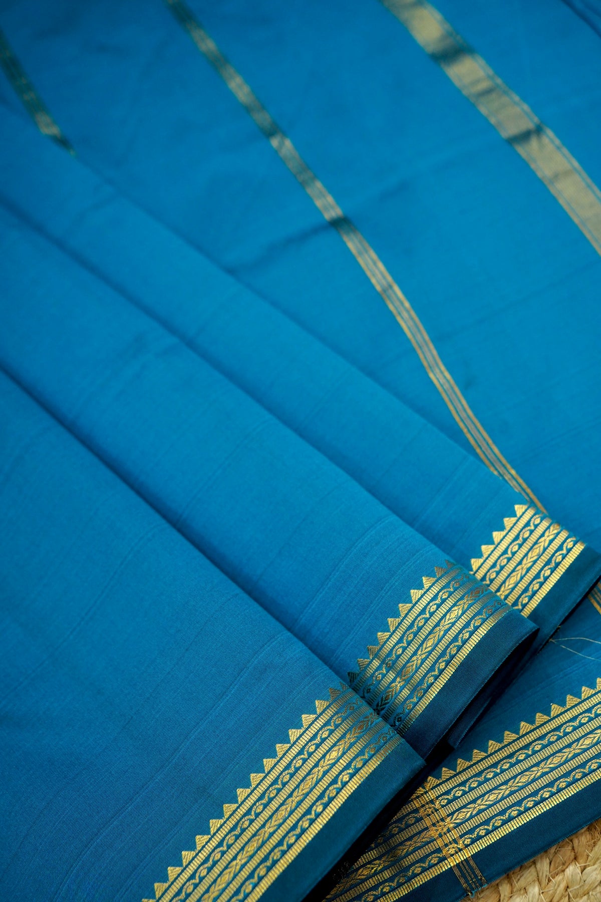 Suvarna - Peacock Blue Mysore Crepe Silk Saree with Gold Kaat Border