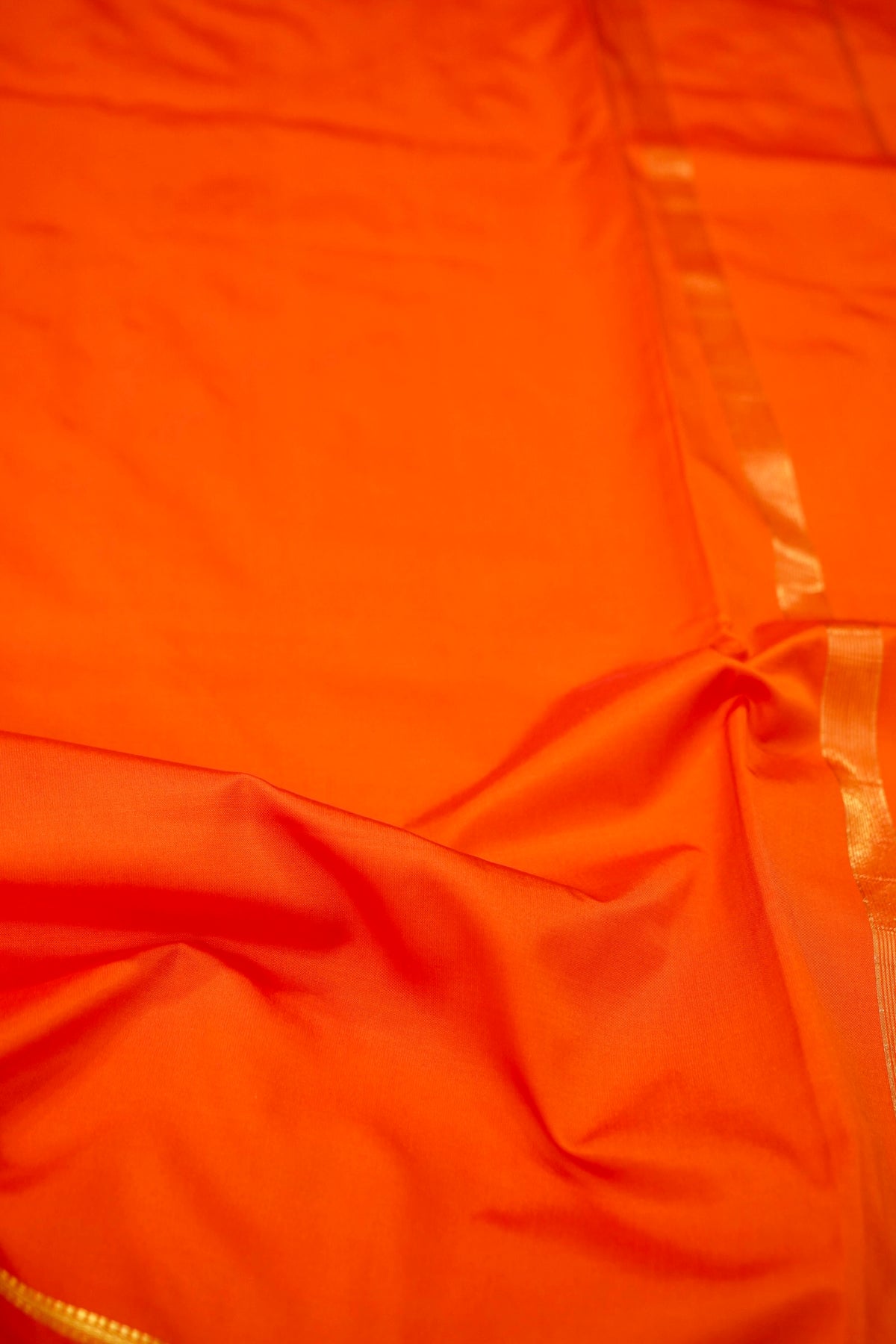 Suvarna - Vibrant Orange Mysore Crepe Silk Saree with Gold Fine Border