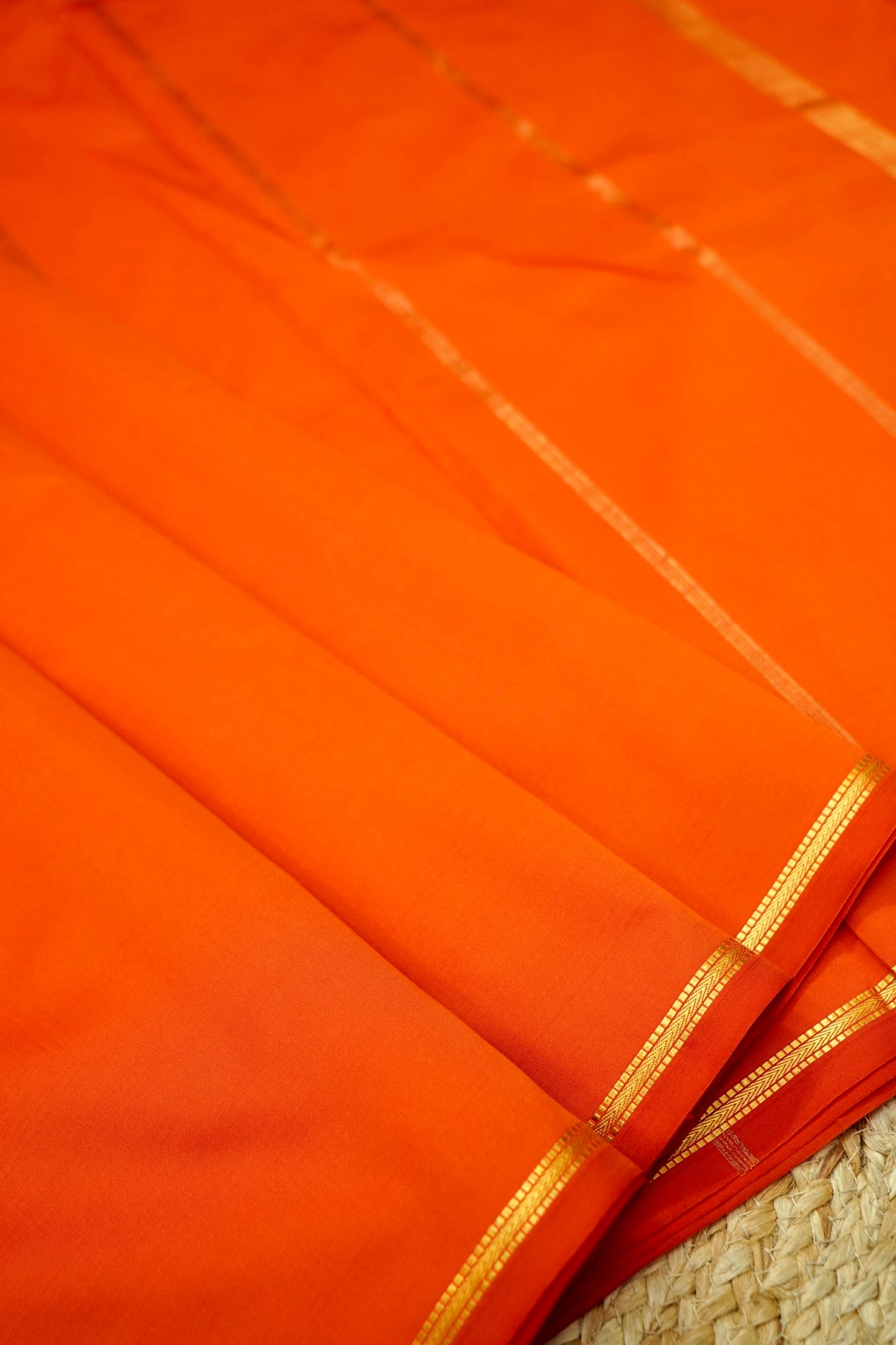 Suvarna - Vibrant Orange Mysore Crepe Silk Saree with Gold Fine Border