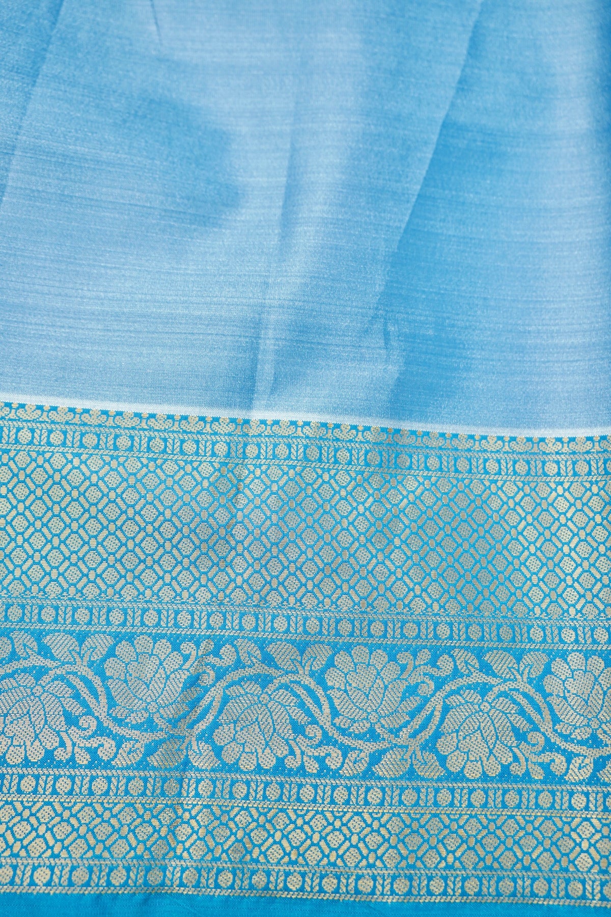Suvarna - Powder Blue Dharmavaram Tissue Silk Saree