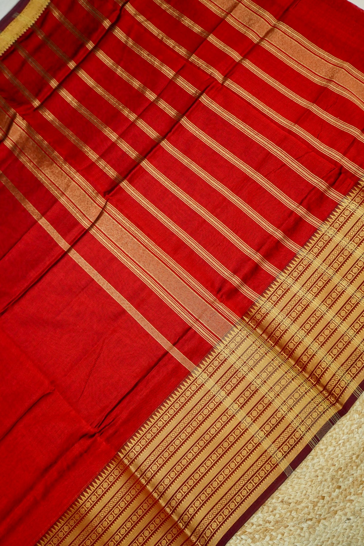 Suvarna - Ruby Red Gadwal Silk Saree with Antique Gold Zari Border