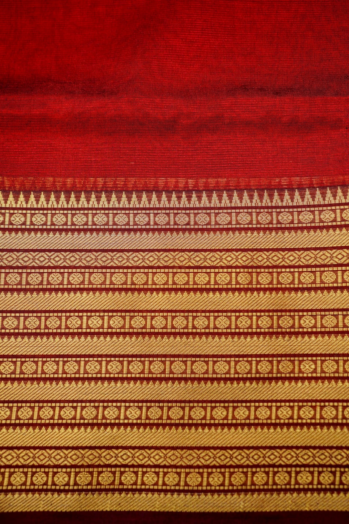 Suvarna - Ruby Red Gadwal Silk Saree with Antique Gold Zari Border