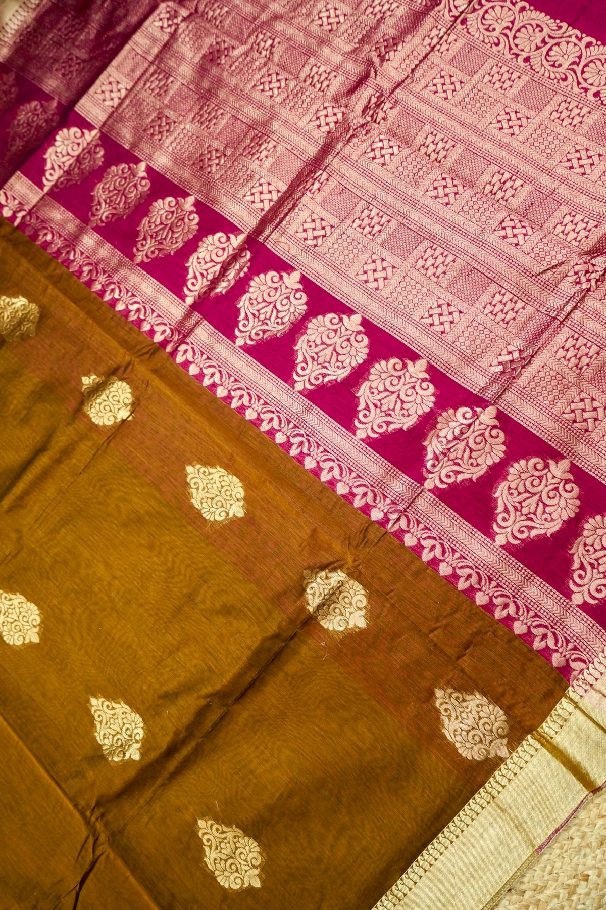 Suvarna - Rust Brown Maheshwari Silk Saree with Antique Gold Border