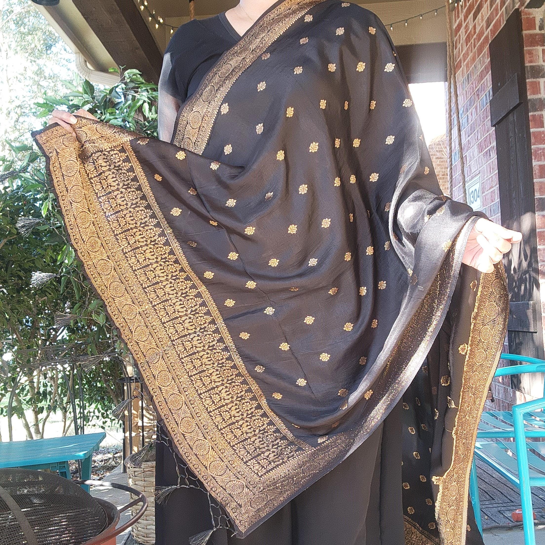 Banarasi Black Dola Silk with Golden Zari border & Floral motifs