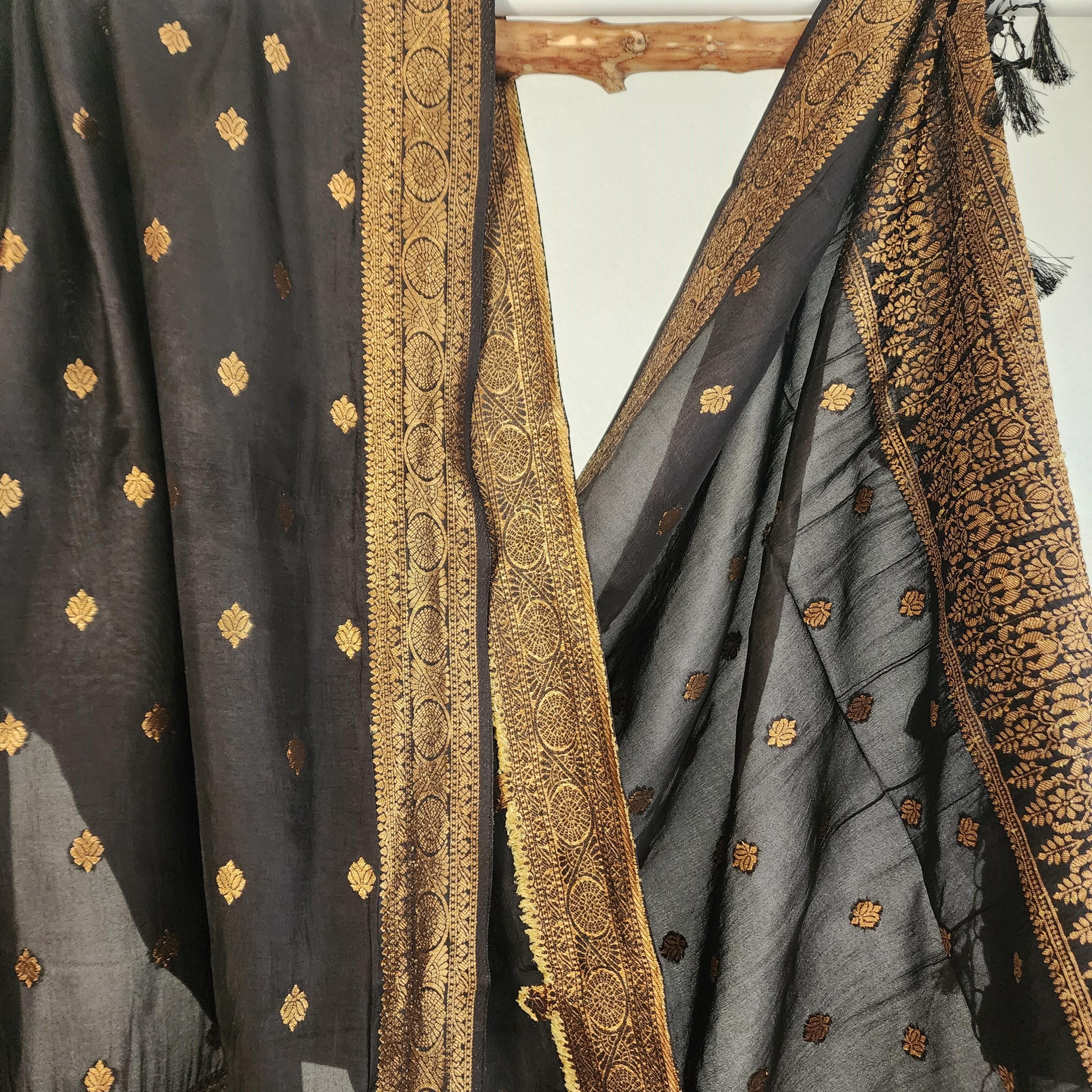 Banarasi Black Dola Silk with Golden Zari border & Floral motifs