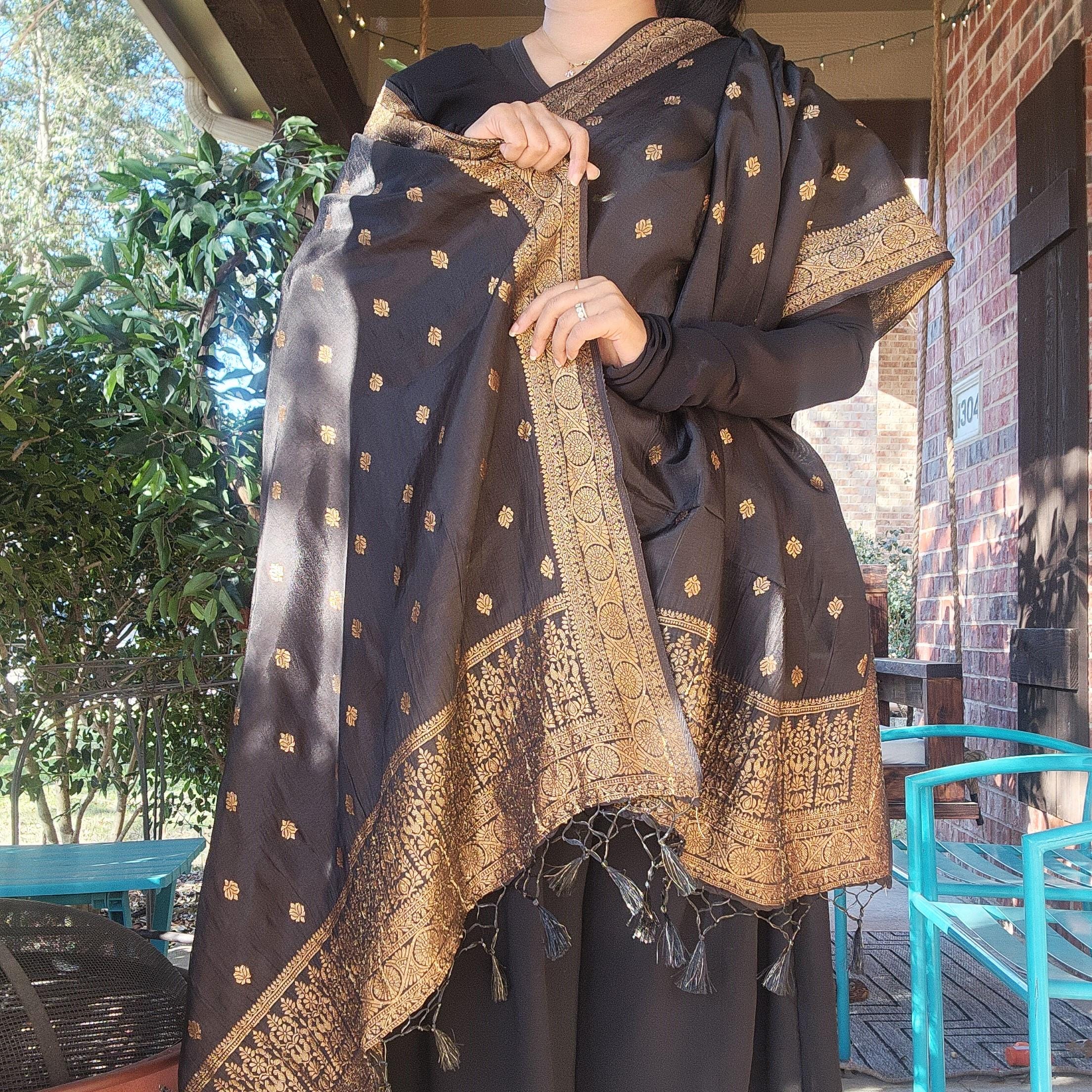 Banarasi Black Dola Silk with Golden Zari border & Floral motifs