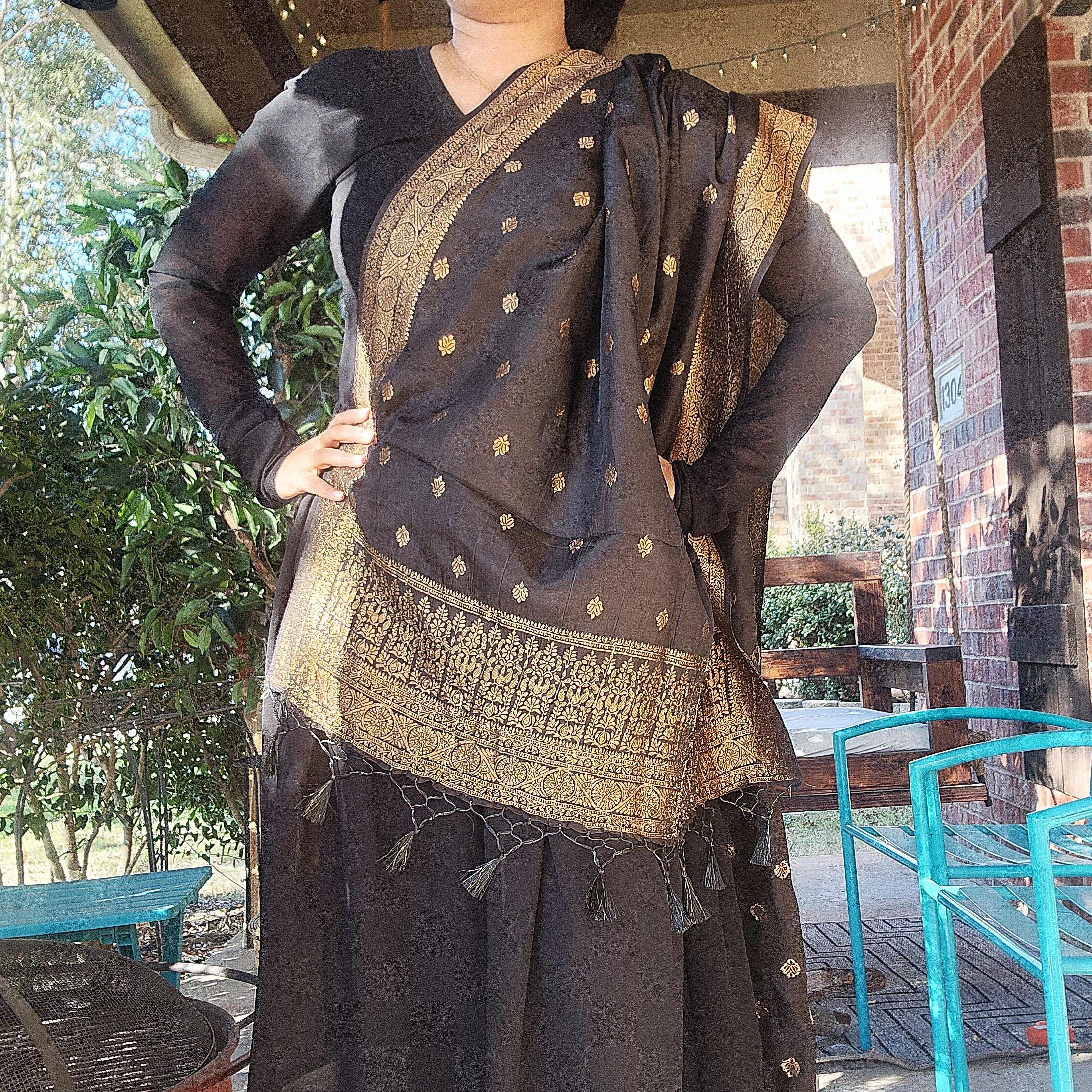 Banarasi Black Dola Silk with Golden Zari border & Floral motifs