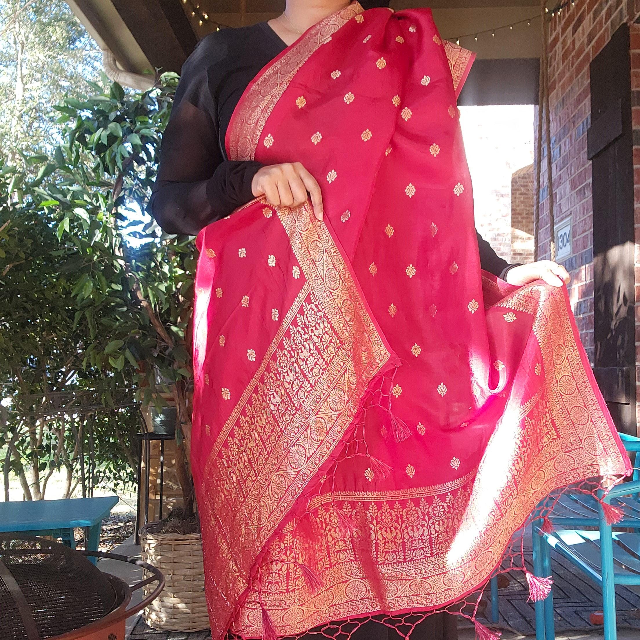 Banarasi Maroon Red Dola Silk with Golden Zari border & Floral motifs