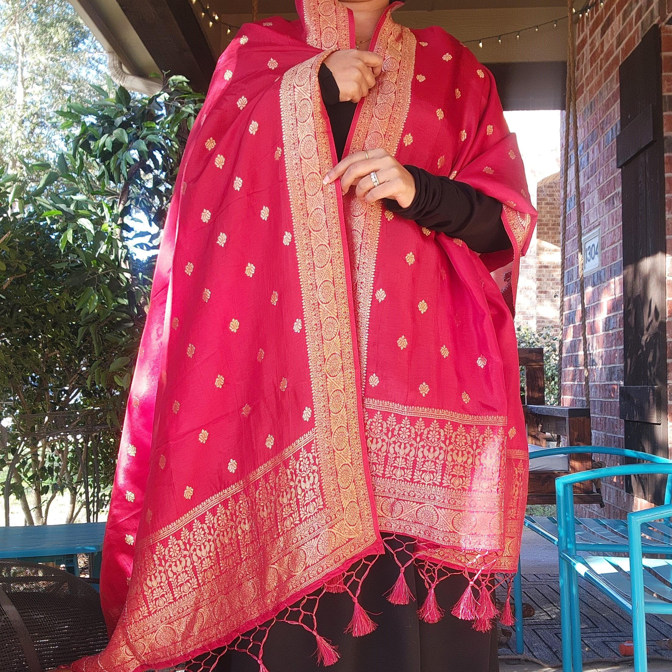 Banarasi Maroon Red Dola Silk with Golden Zari border & Floral motifs