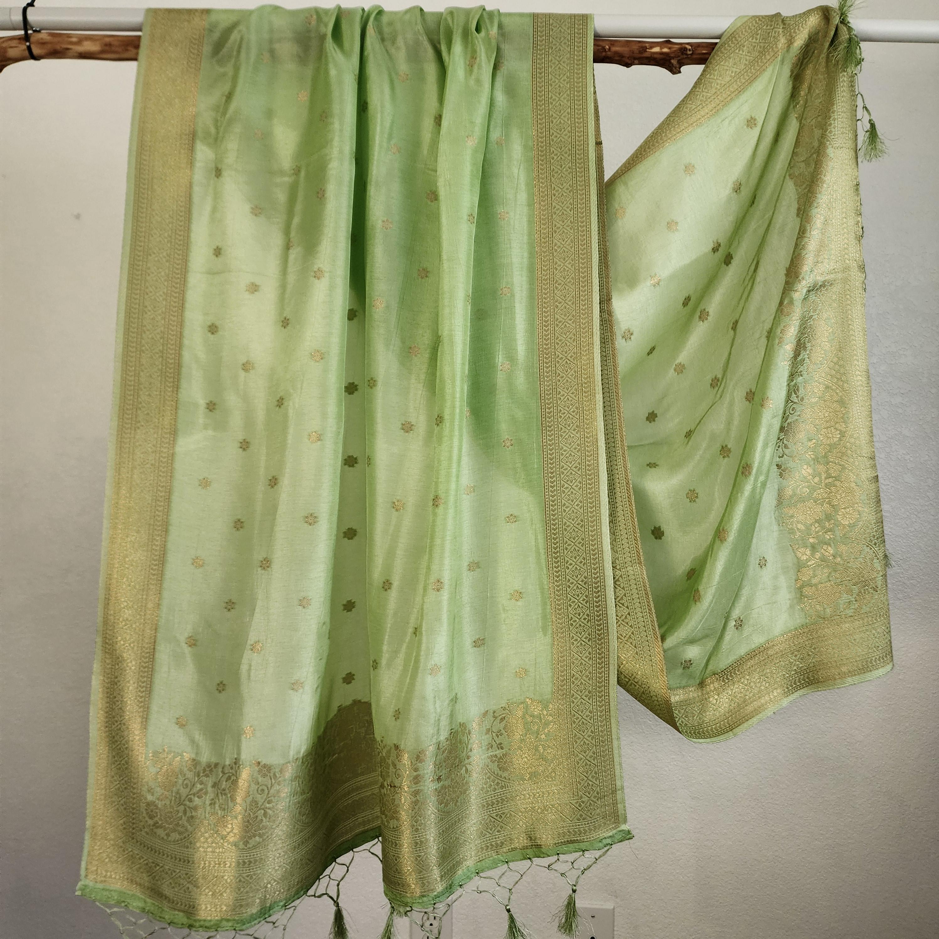 Banarasi Light Green Dola Silk with Golden Zari border & Floral motifs