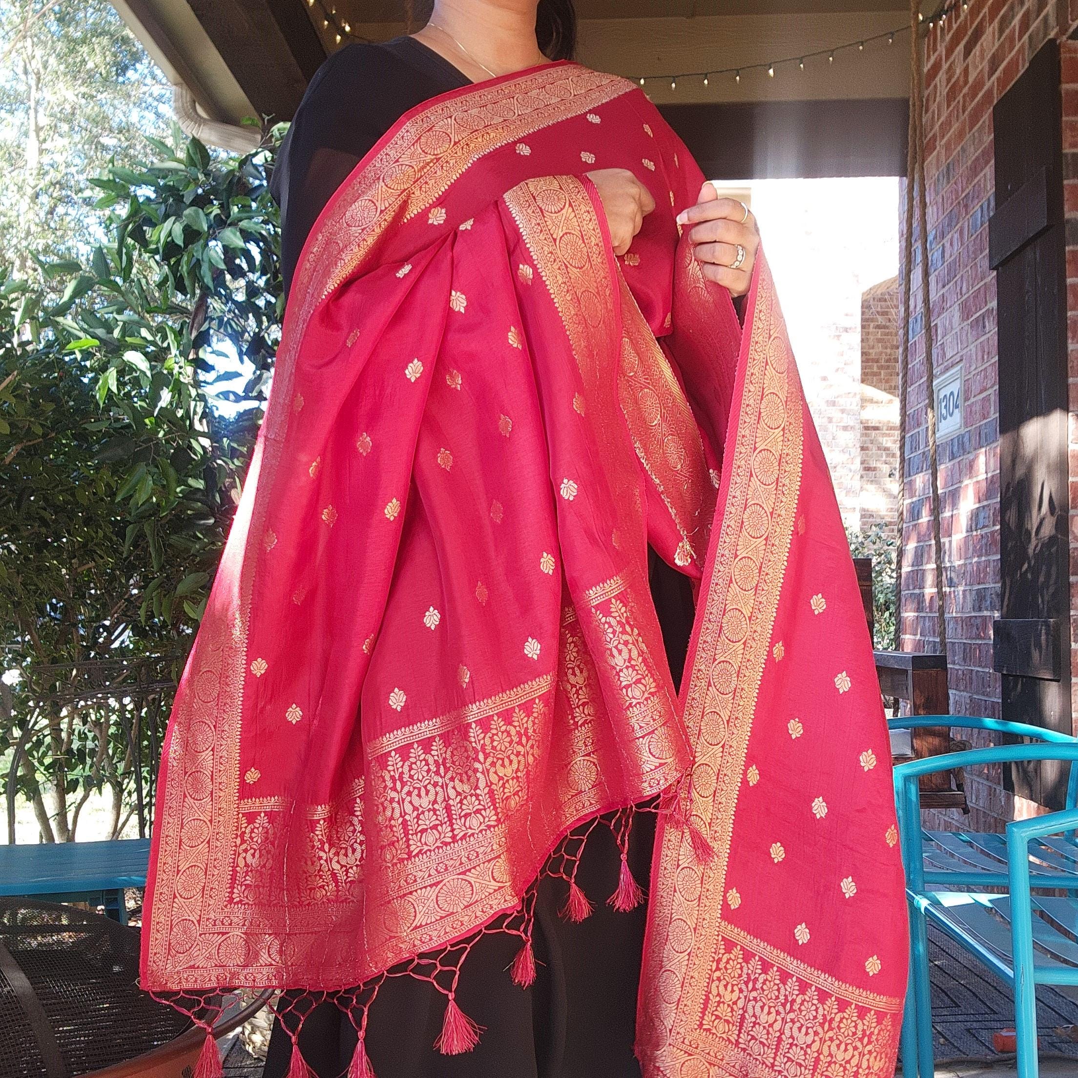 Banarasi Maroon Red Dola Silk with Golden Zari border & Floral motifs