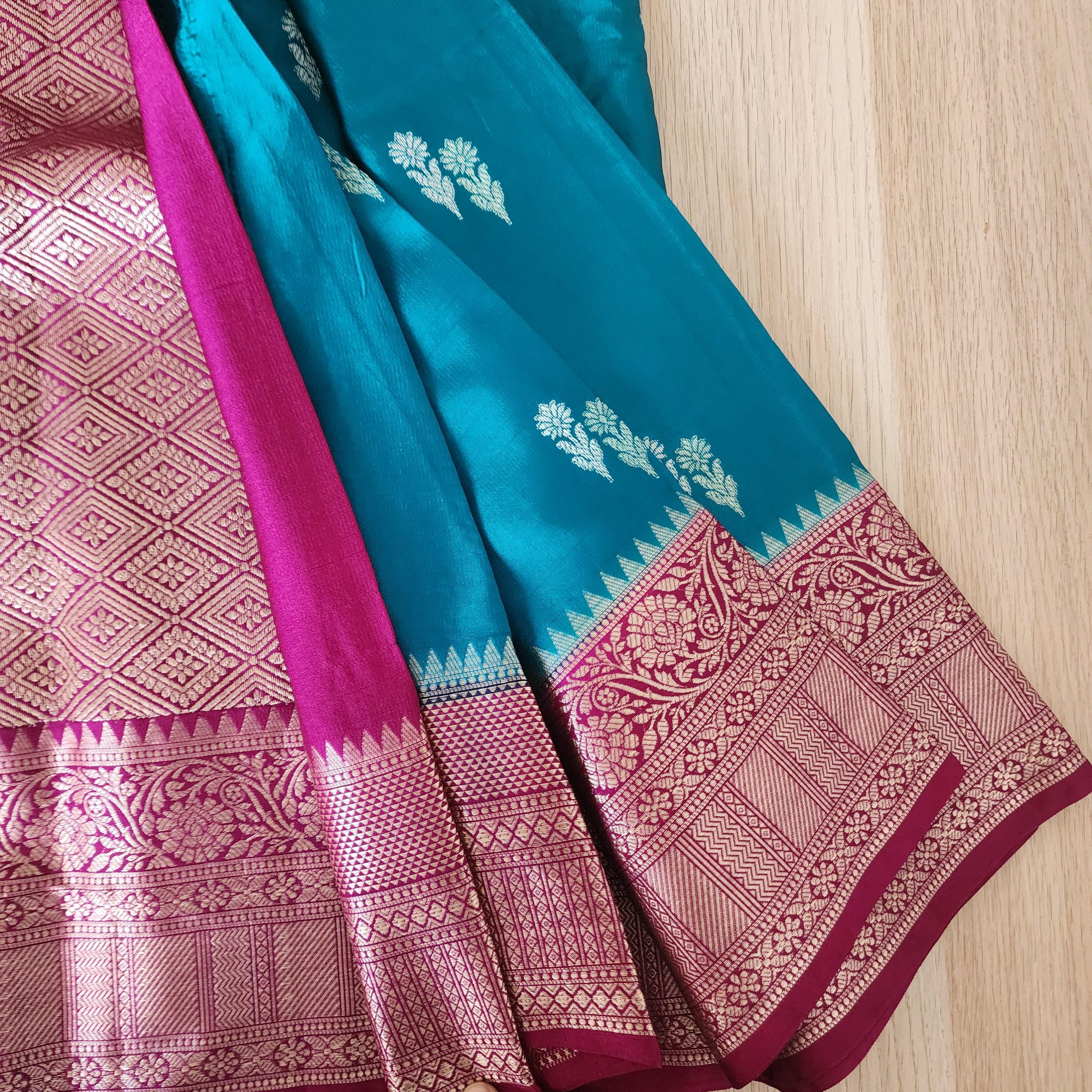 Turquoise Mashru Silk Saree with Rich Magenta Border