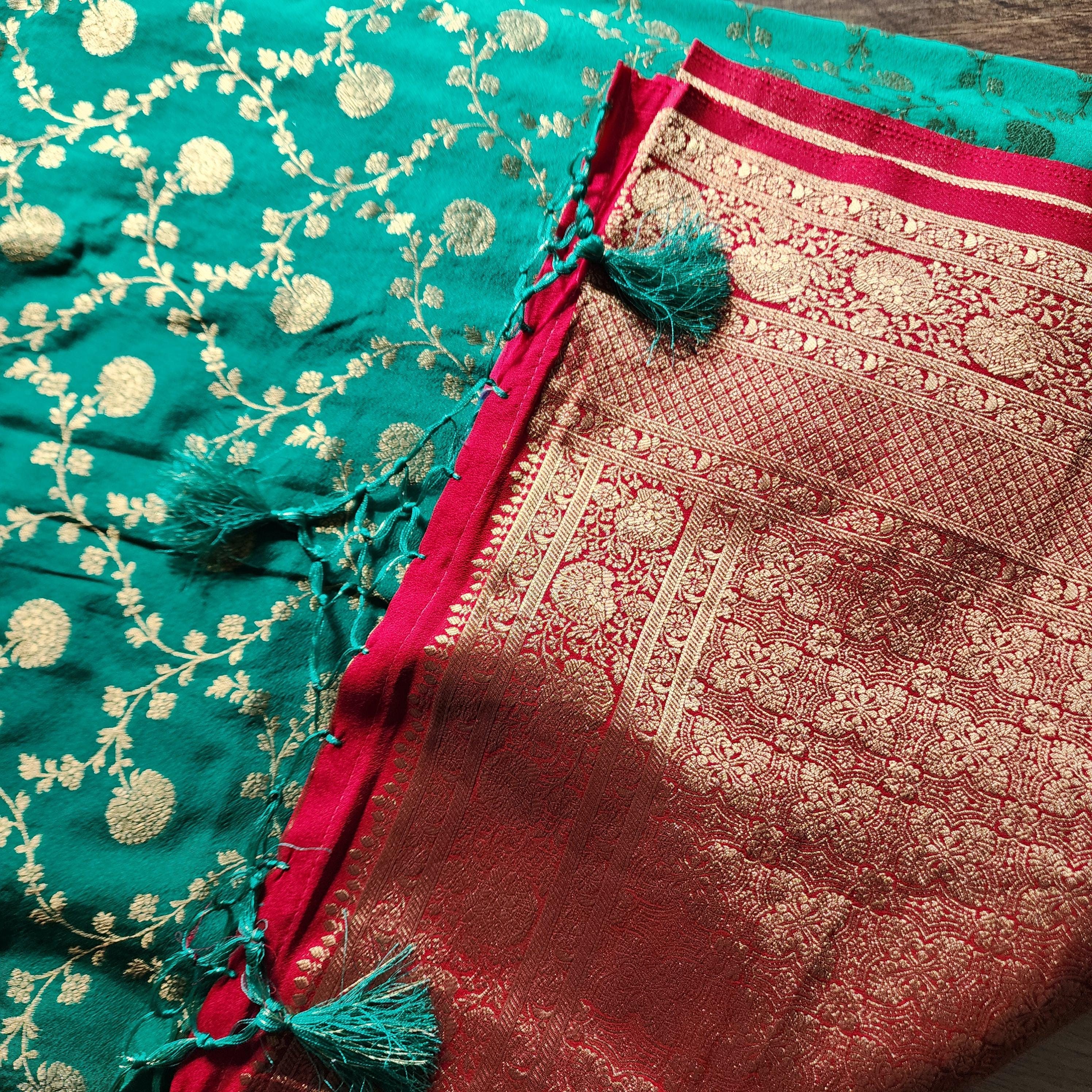 Emerald Green Banarasi Saree with traditional Red Jaal border