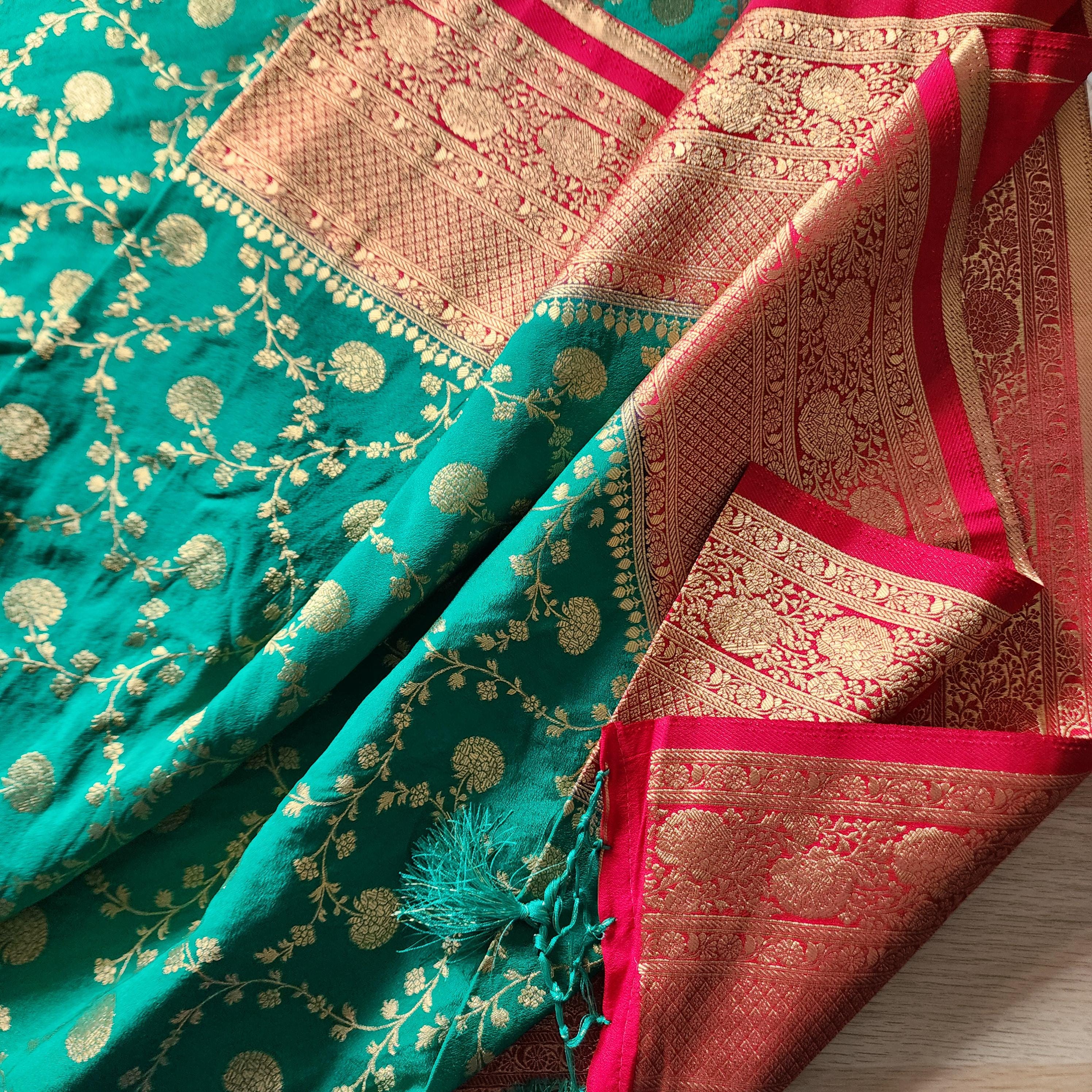 Emerald Green Banarasi Saree with traditional Red Jaal border