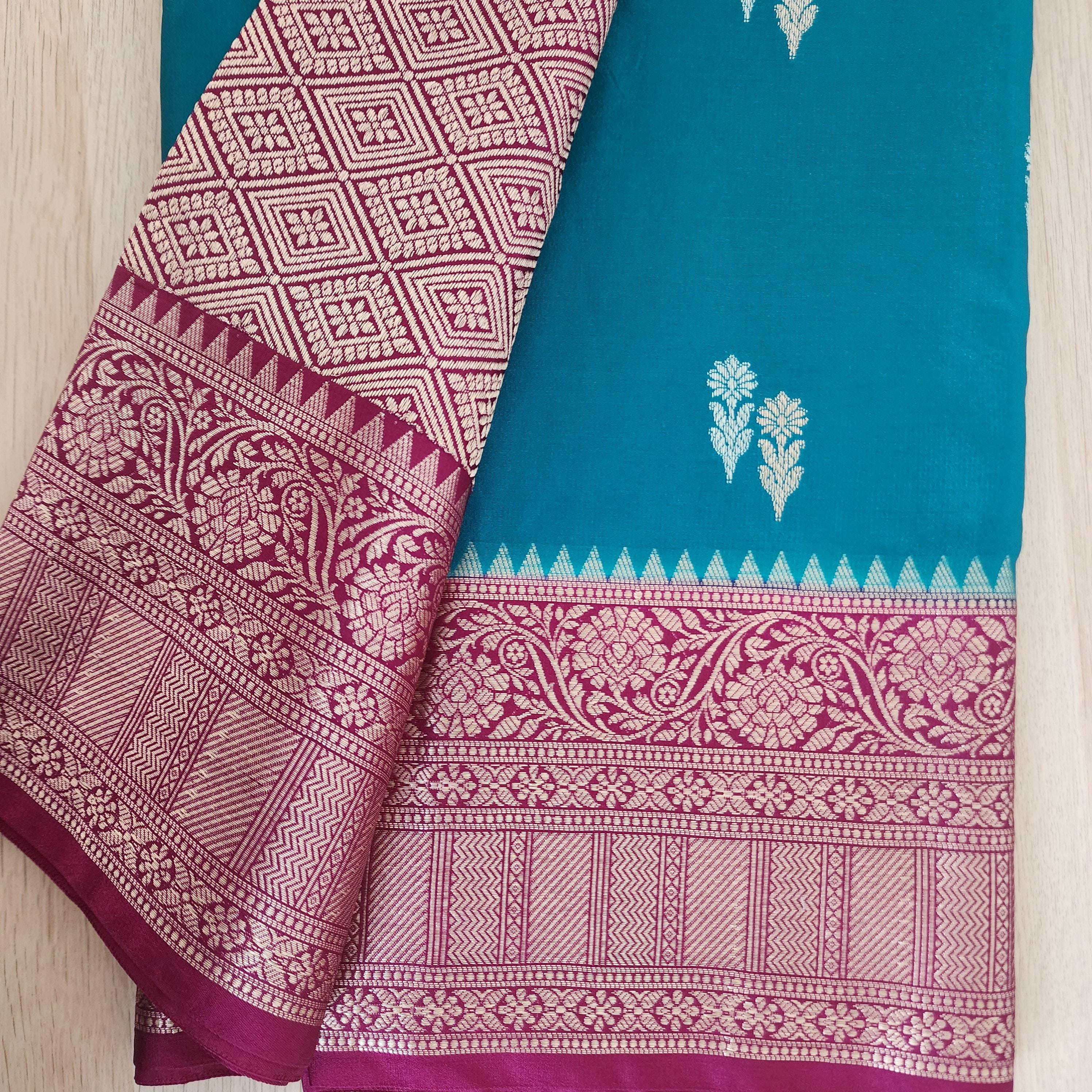 Turquoise Mashru Silk Saree with Rich Magenta Border