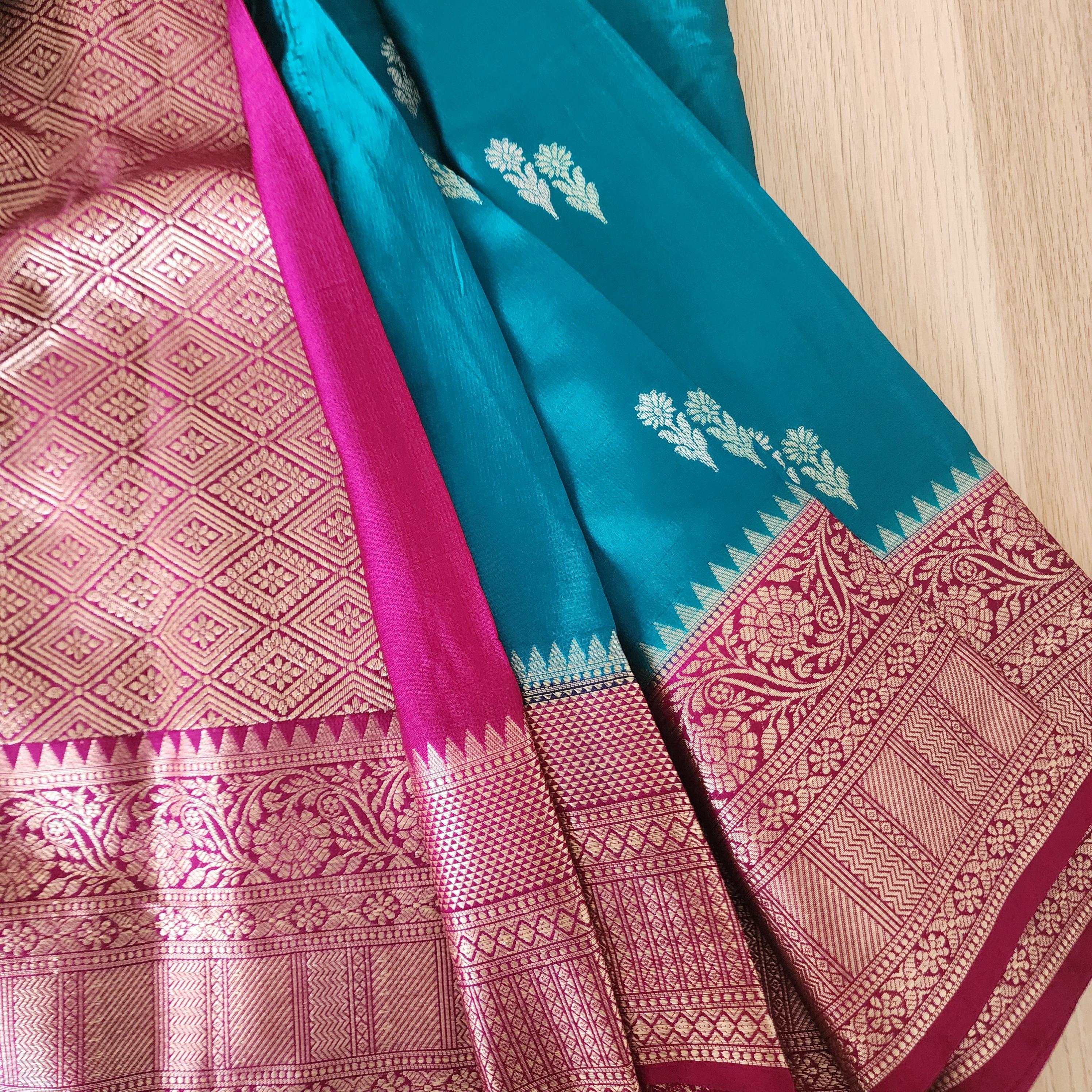 Turquoise Mashru Silk Saree with Rich Magenta Border