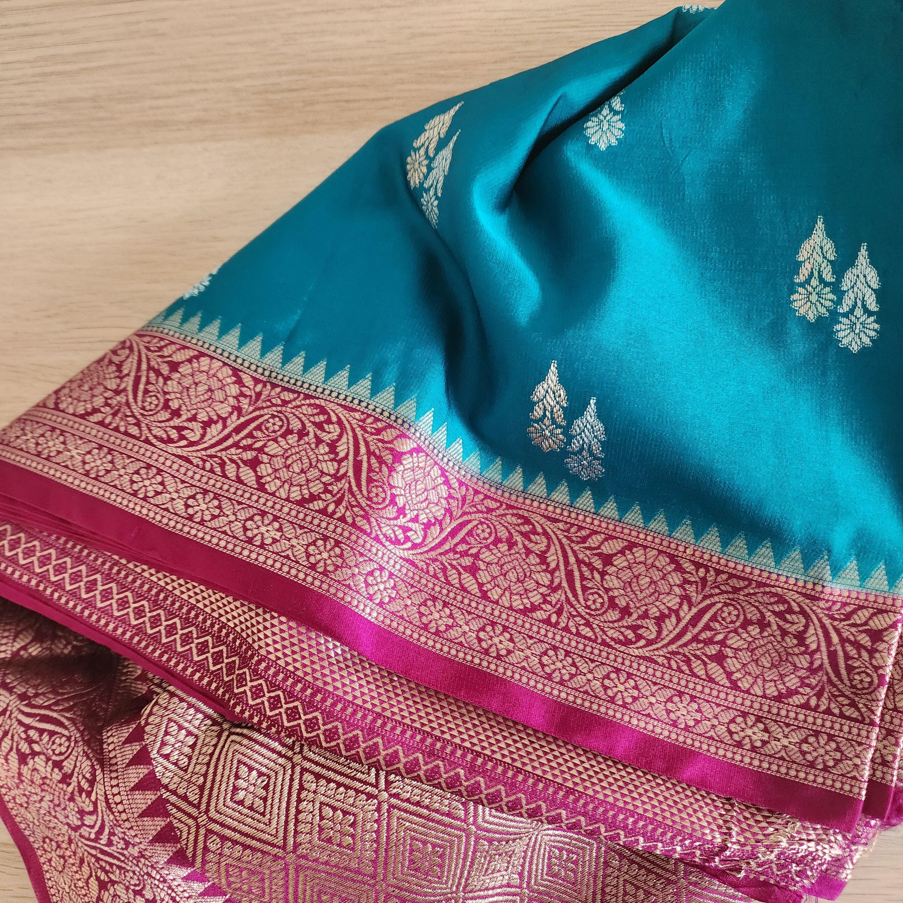 Turquoise Mashru Silk Saree with Rich Magenta Border