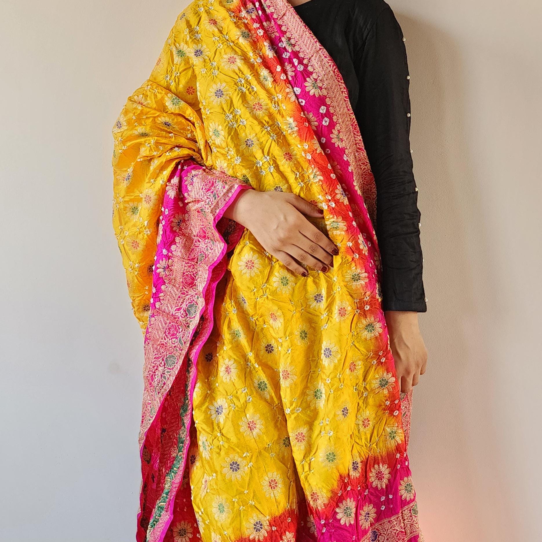 Rich Gold Bandhni dupatta with Rani Pink border & Banarasi Meenakari work
