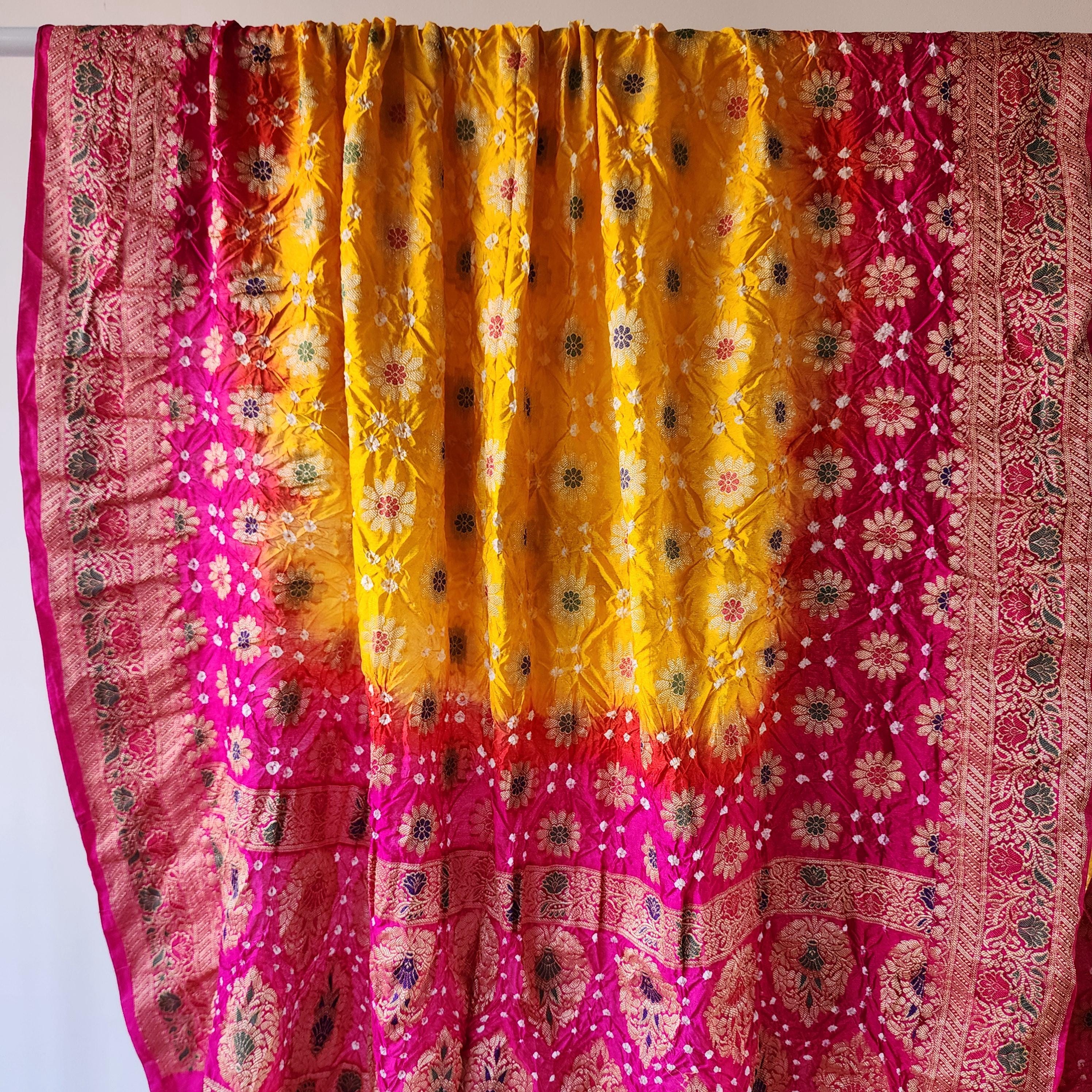 Rich Gold Bandhni dupatta with Rani Pink border & Banarasi Meenakari work
