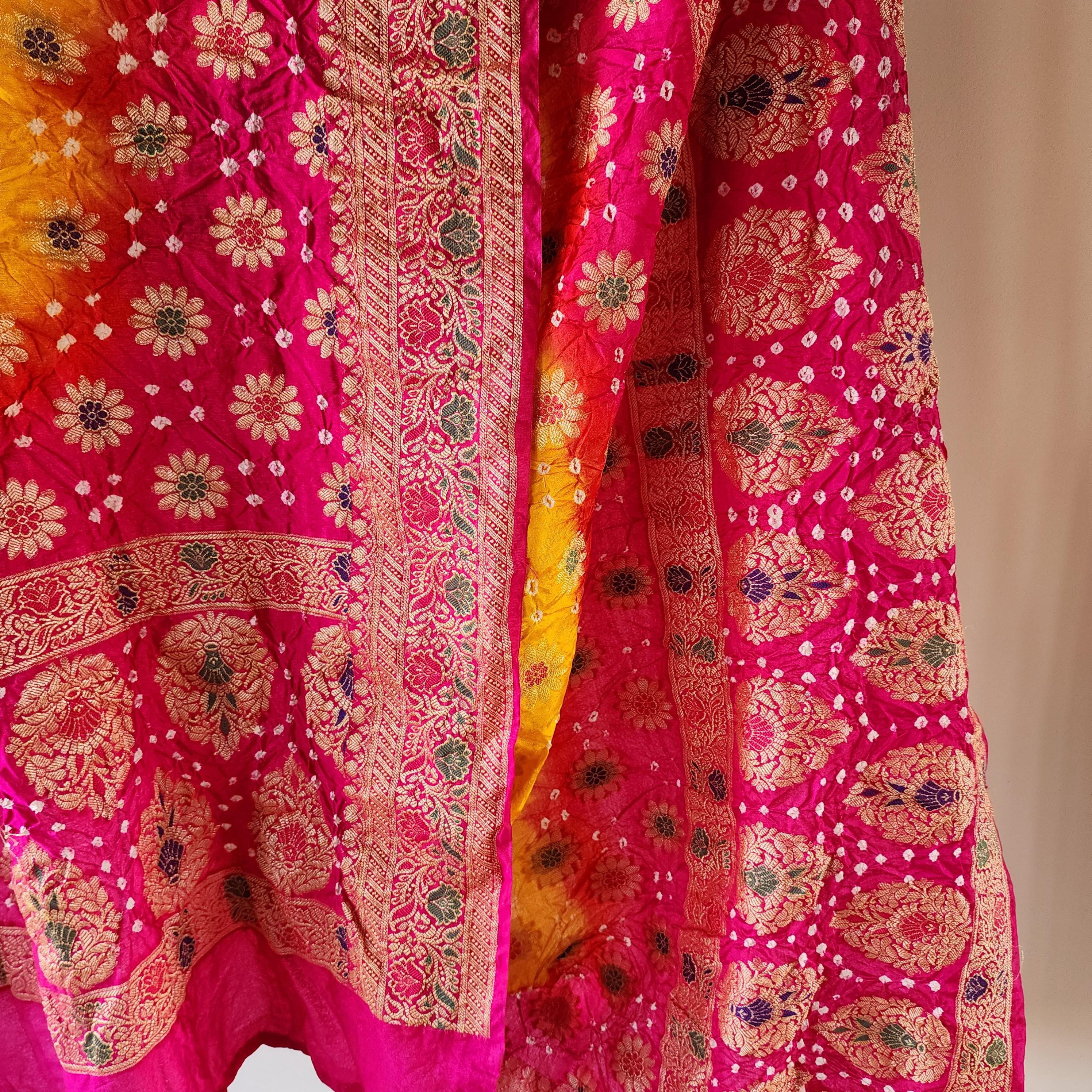 Rich Gold Bandhni dupatta with Rani Pink border & Banarasi Meenakari work
