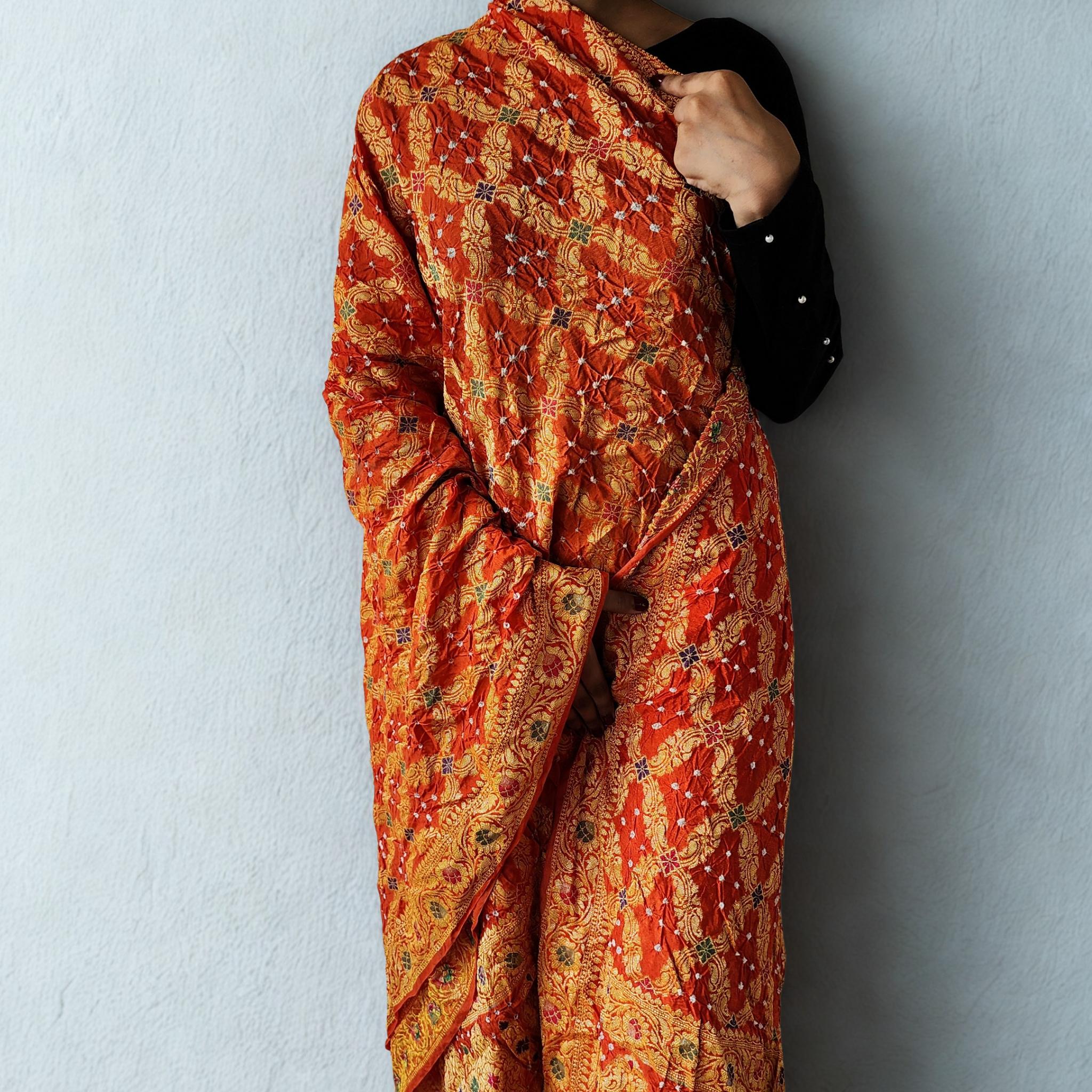 Orange & gold Bandhni dupatta with Banarasi Meenakari work