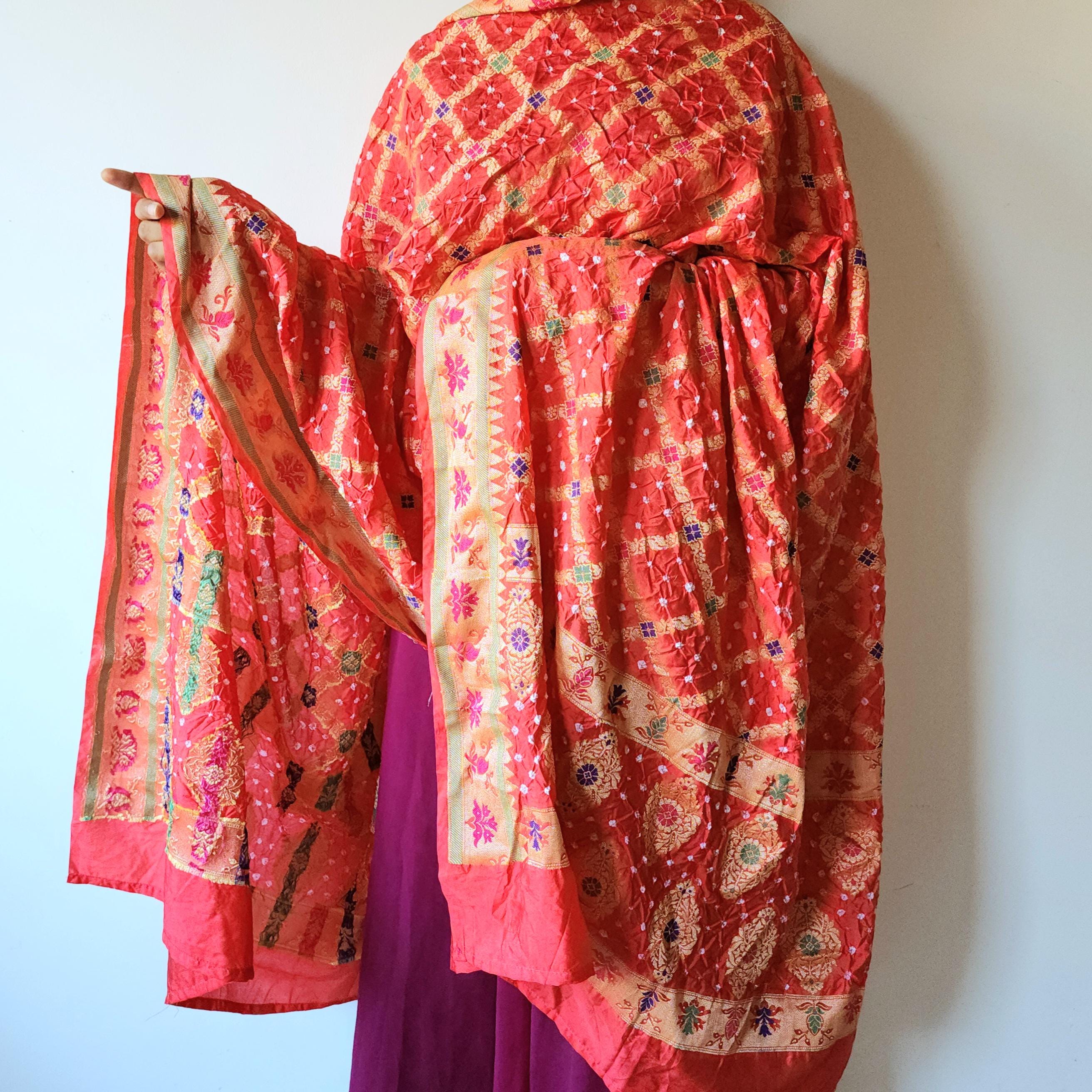 Tomato Red Bandhni Dupatta with Golden Border & Banarasi Meenakari Work