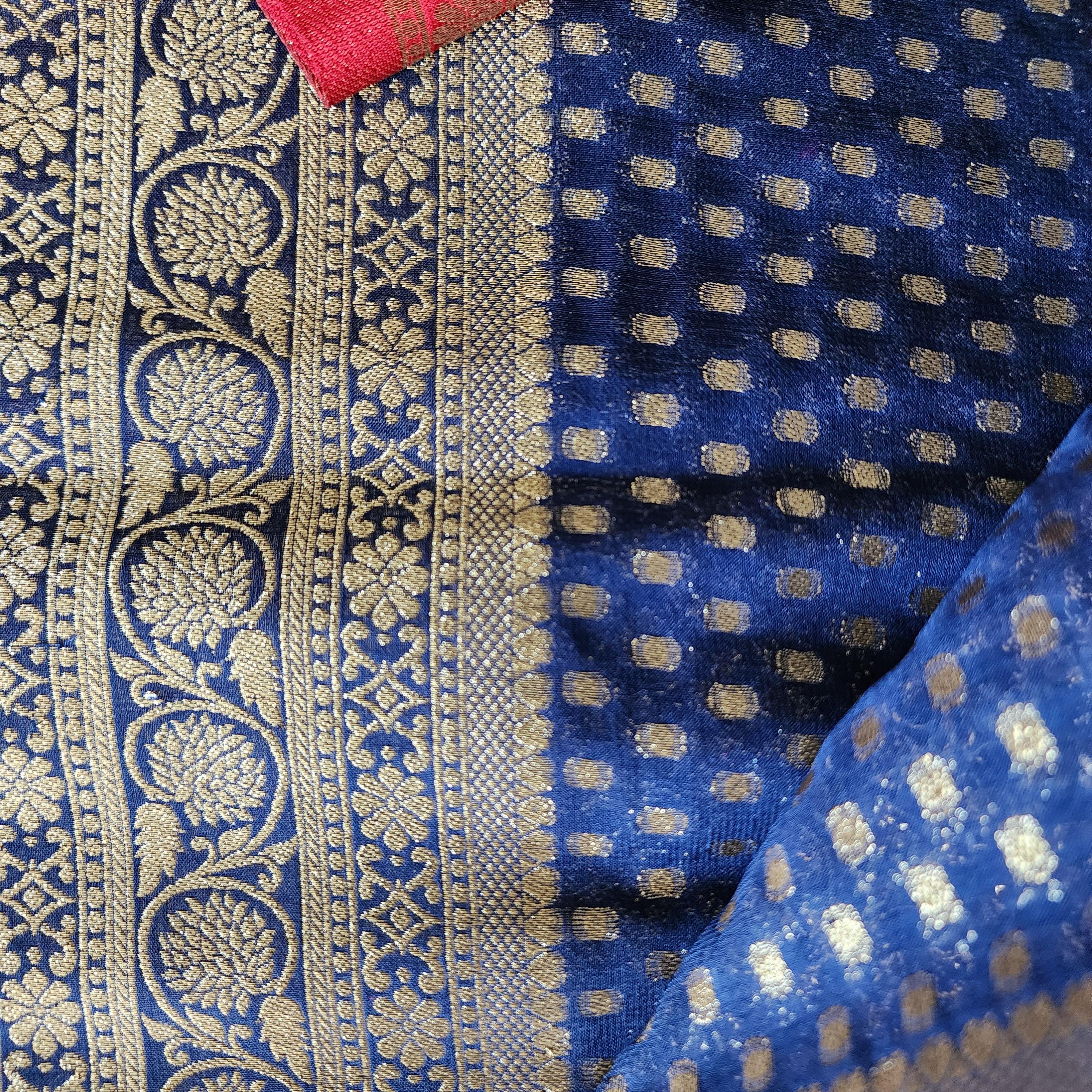 Dazzling Navy Blue & Red Khaddi Georgette Banarasi Saree Light, Elegant, and Flowy