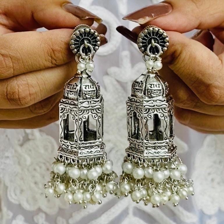Temple Style Oxidized Silver Jhumkas with Traditional Architecture Motifs and Pearl Drops for Bridal Wear