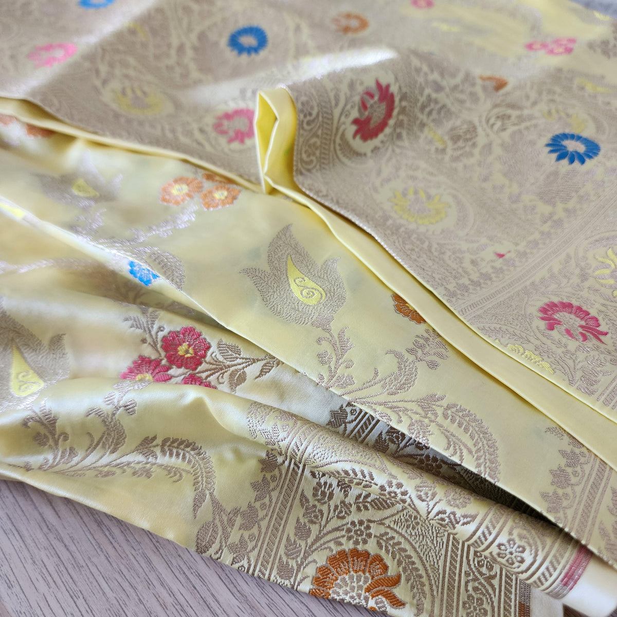 Enriched Butter Yellow Banarasi Katan Silk Saree with Multicolor Meenakari Floral Jaal