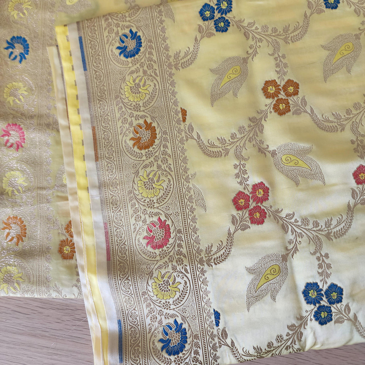Enriched Butter Yellow Banarasi Katan Silk Saree with Multicolor Meenakari Floral Jaal