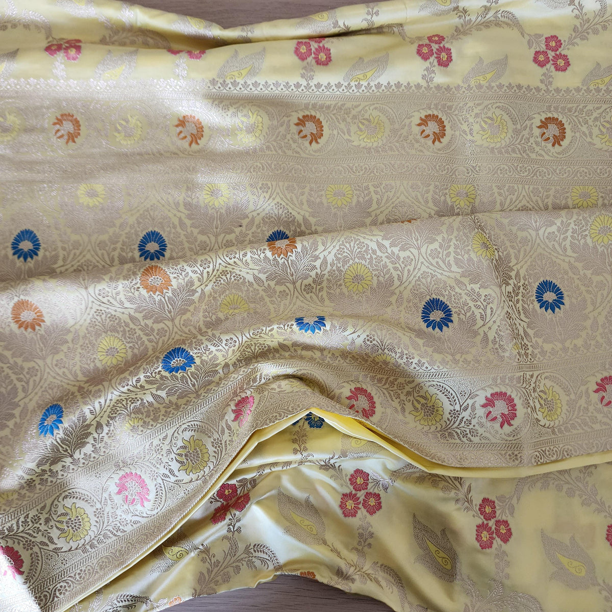 Enriched Butter Yellow Banarasi Katan Silk Saree with Multicolor Meenakari Floral Jaal