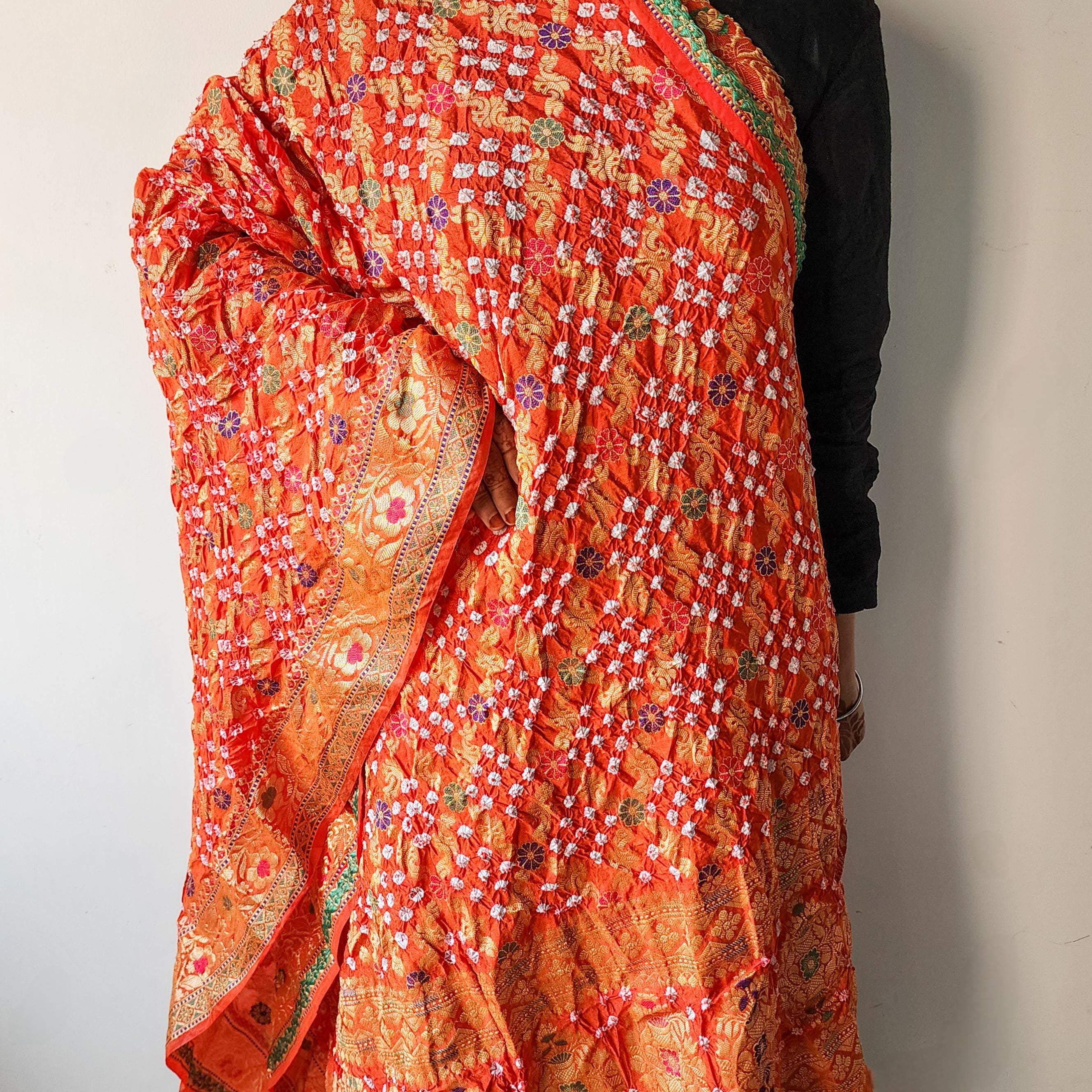 Orange Bandhni dupatta with Banarasi Meenakari work