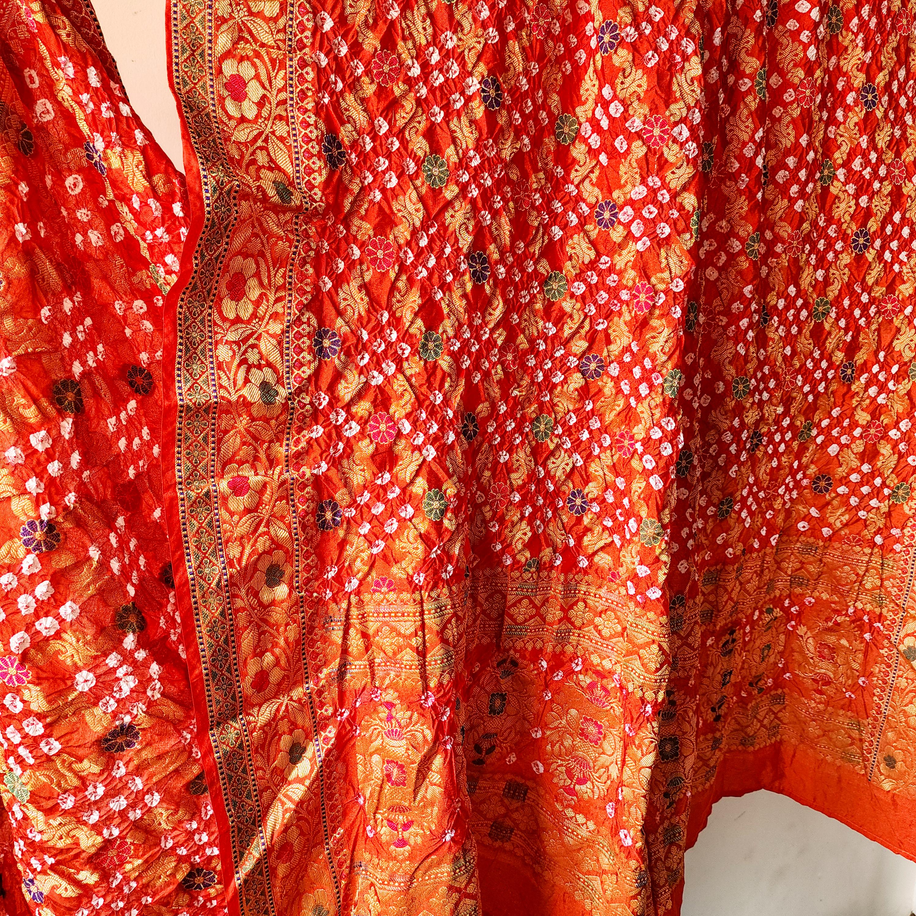 Orange Bandhni dupatta with Banarasi Meenakari work