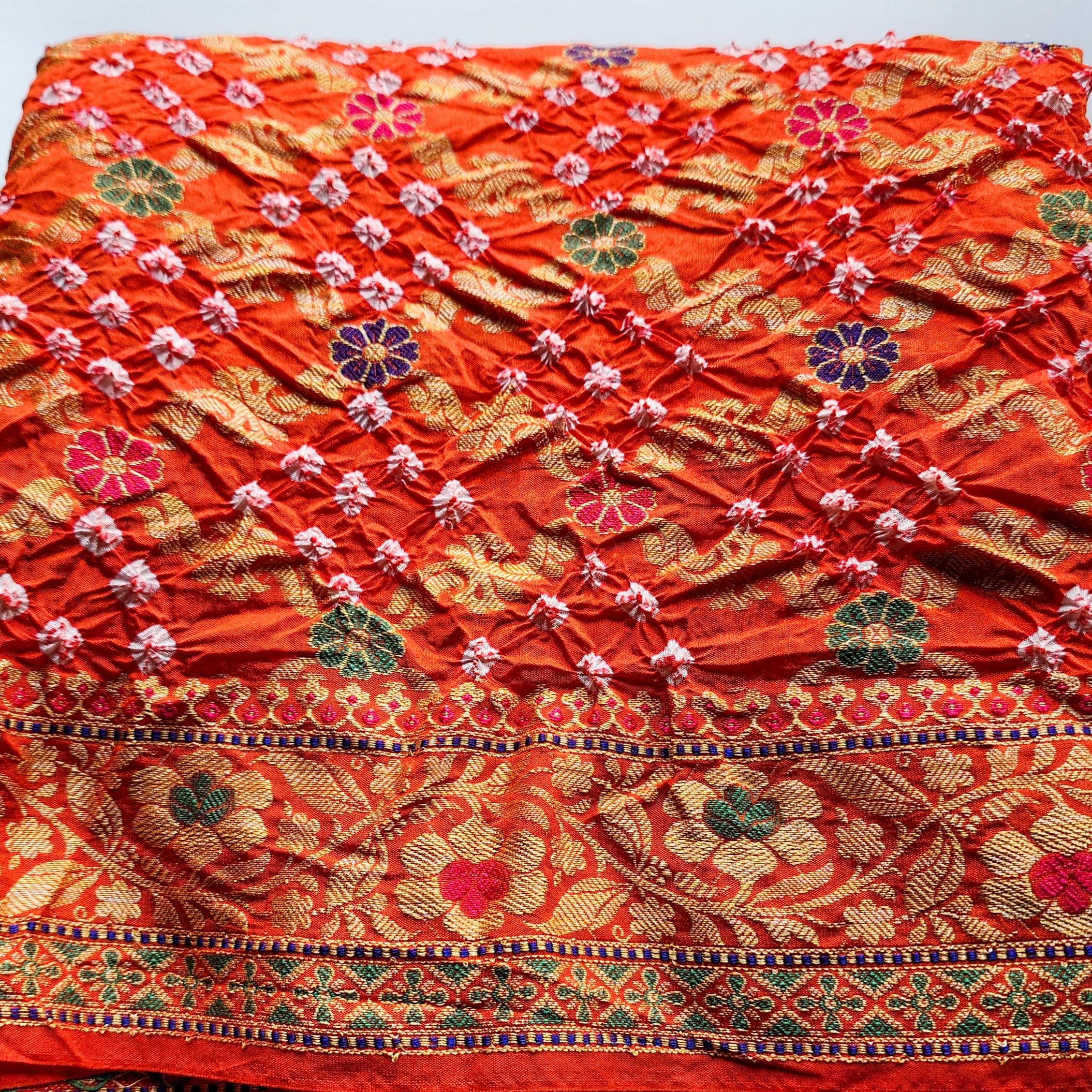 Orange Bandhni dupatta with Banarasi Meenakari work