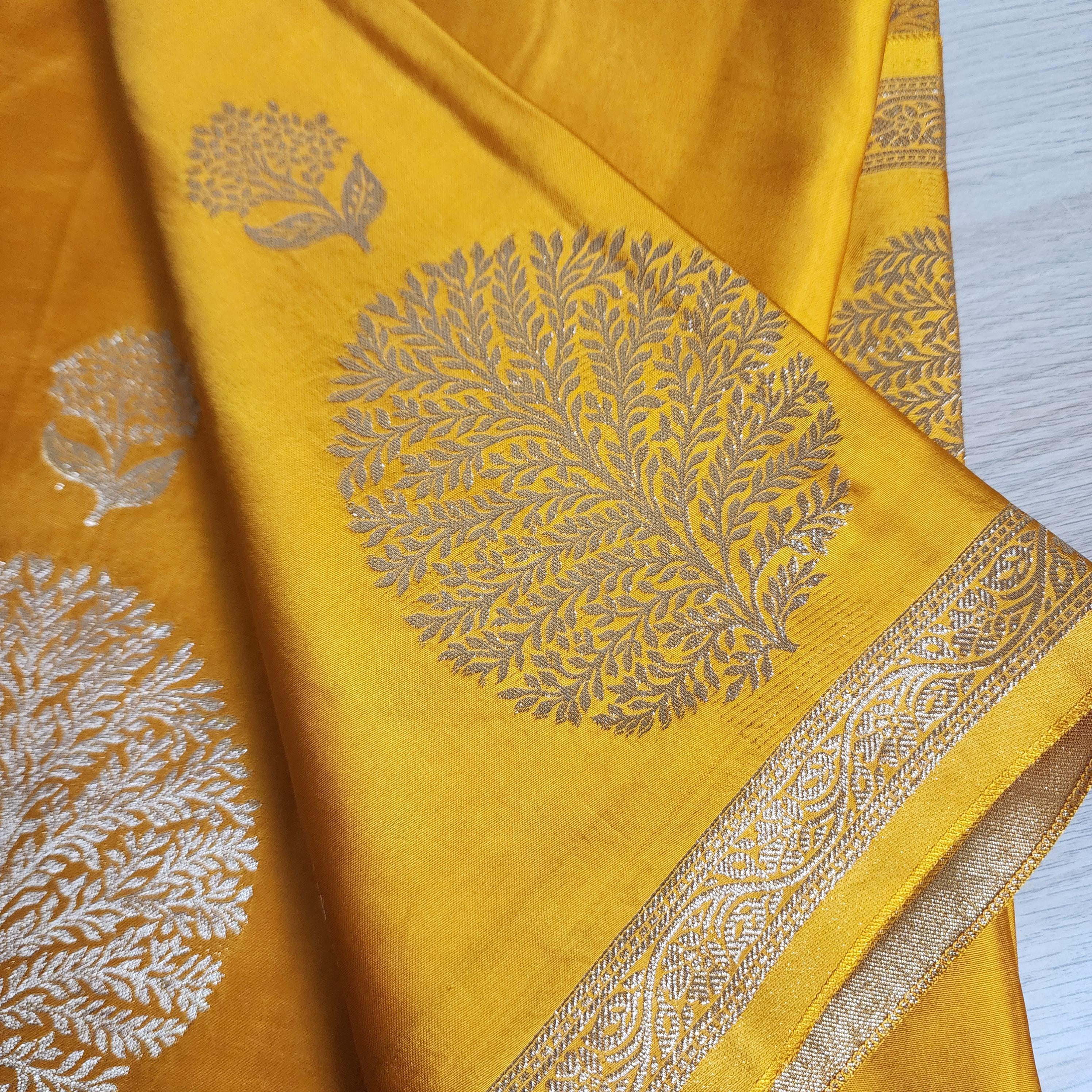 Banarasi Crape Georgette Saree in elegant yellow & light gold Zari